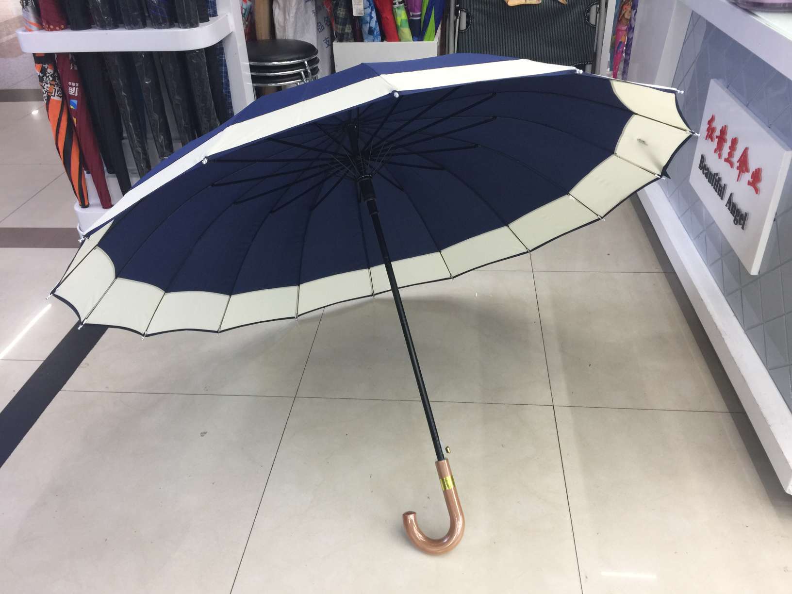 16-bone interlocking woven fabric umbrella with edge wrapping