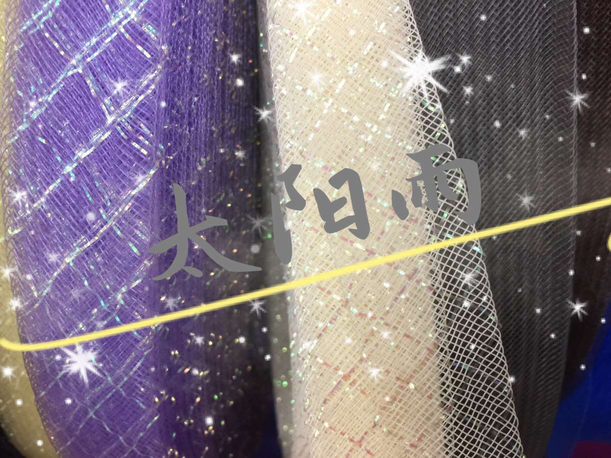 The box is tied with a flowered stretch netted headdress full figure