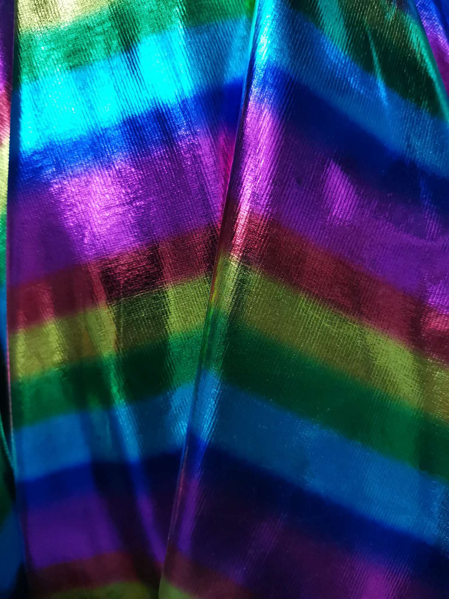 The flat plate is fully embossed with seven-color stripes