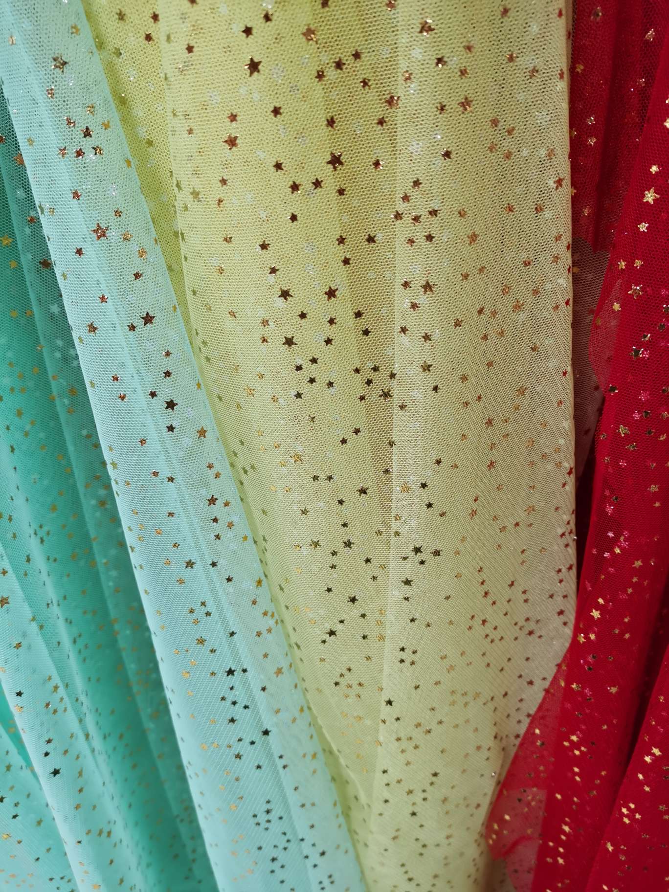 Gold-embossed five-pointed star fabric for clothing accessories Application Scenario