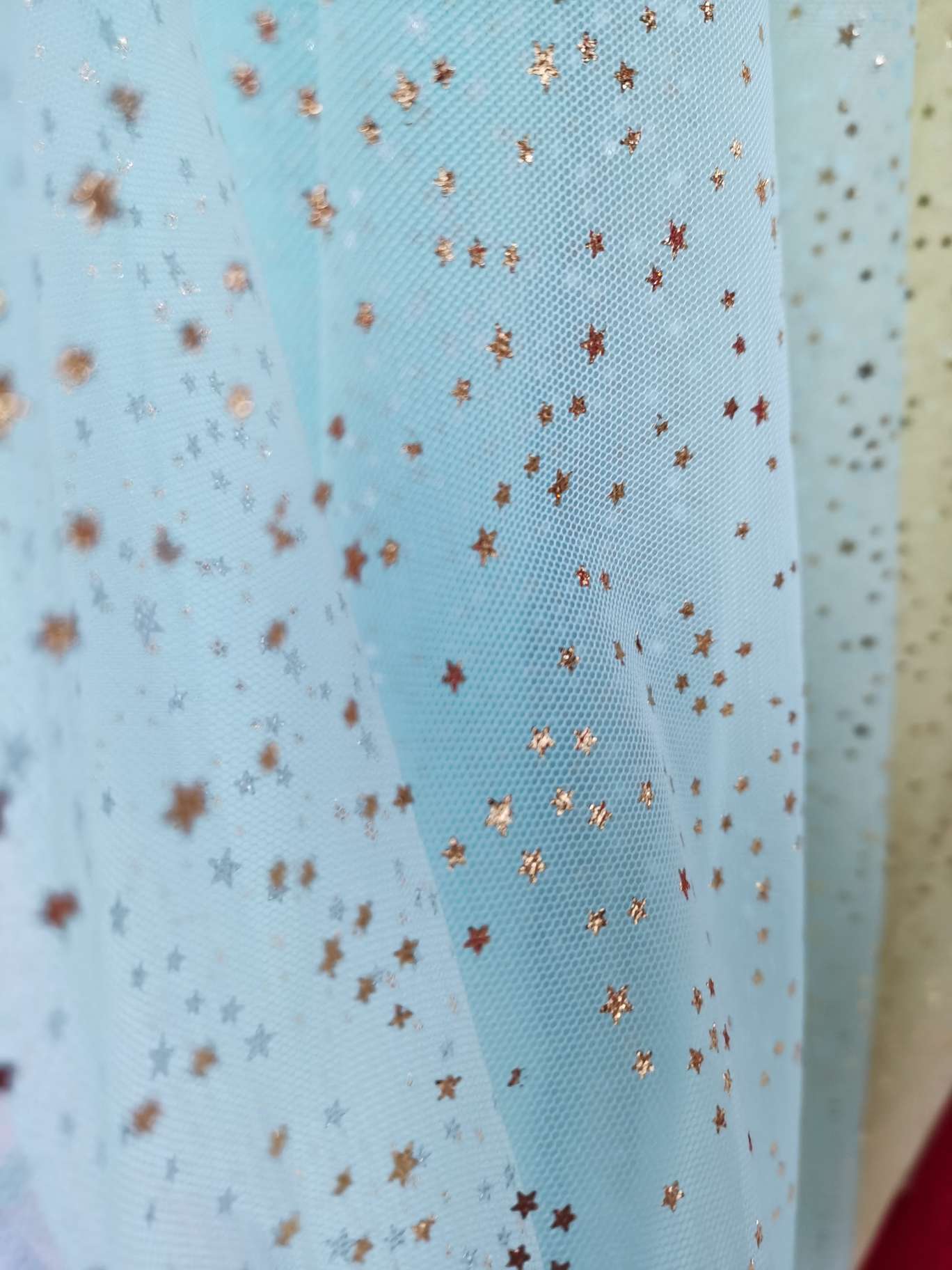 Gold-embossed five-pointed star fabric for clothing accessories Specification image