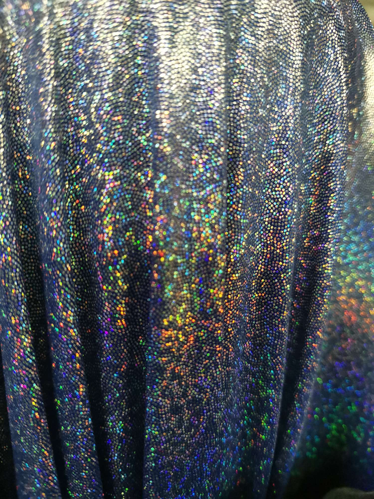 Factory direct sales, wholesale and retail of silver laser fingerprint dots on a knitted sapphire blue background. For orders in stock, please consult
