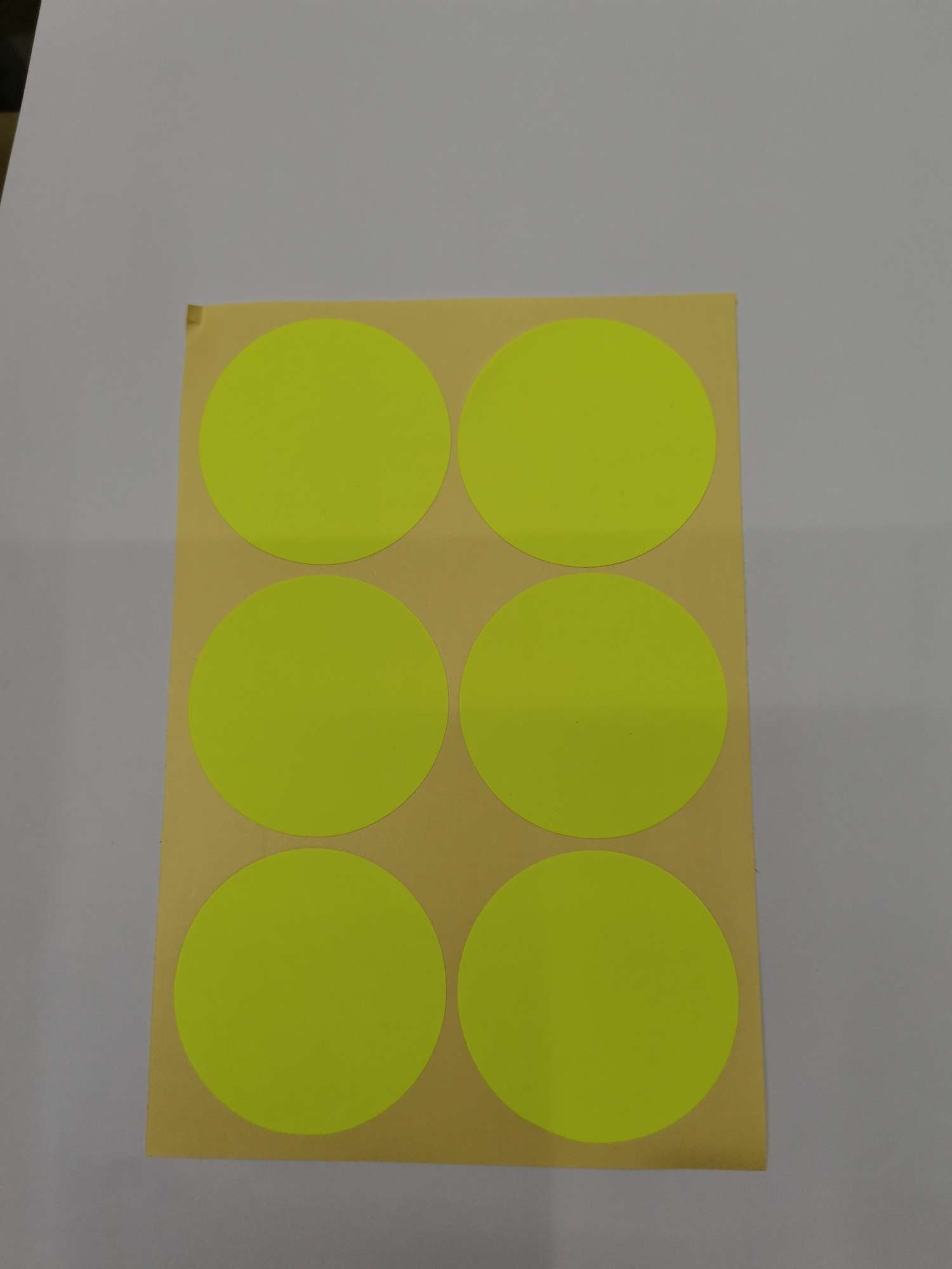 Circular fluorescent adhesive yellow thumbnail