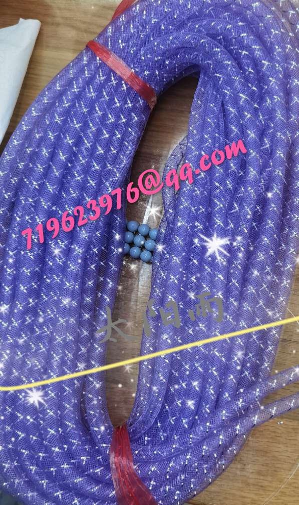 The box is tied with a flowered stretch netted headdress details Picture