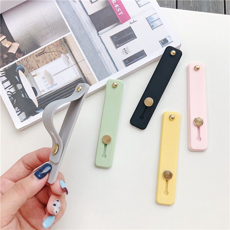 懒人创意手机支架简约塑料手机通用架子便携懒人床头桌面直播追剧白底实物图