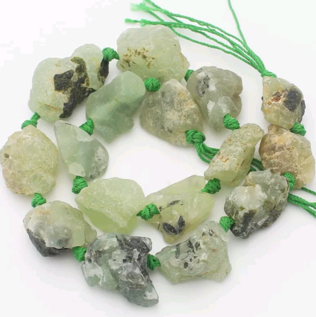 Natural gemstone agate is the material for a shaped necklace and knotting bracelet undefined