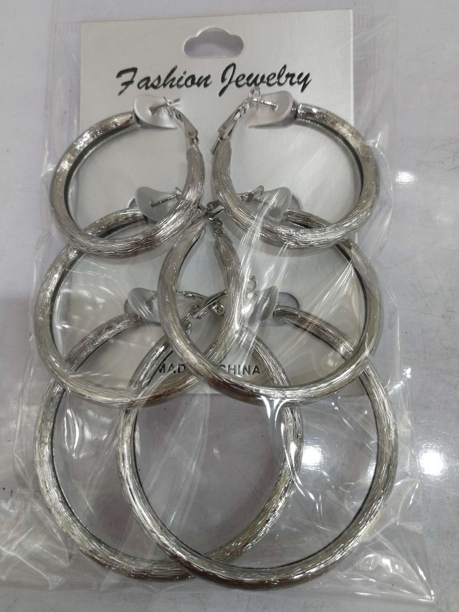 Three pairs of air-tube brushed earrings thumbnail