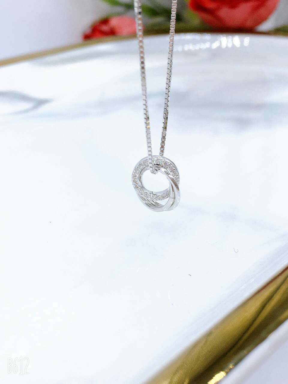 A double-ring sterling silver necklace