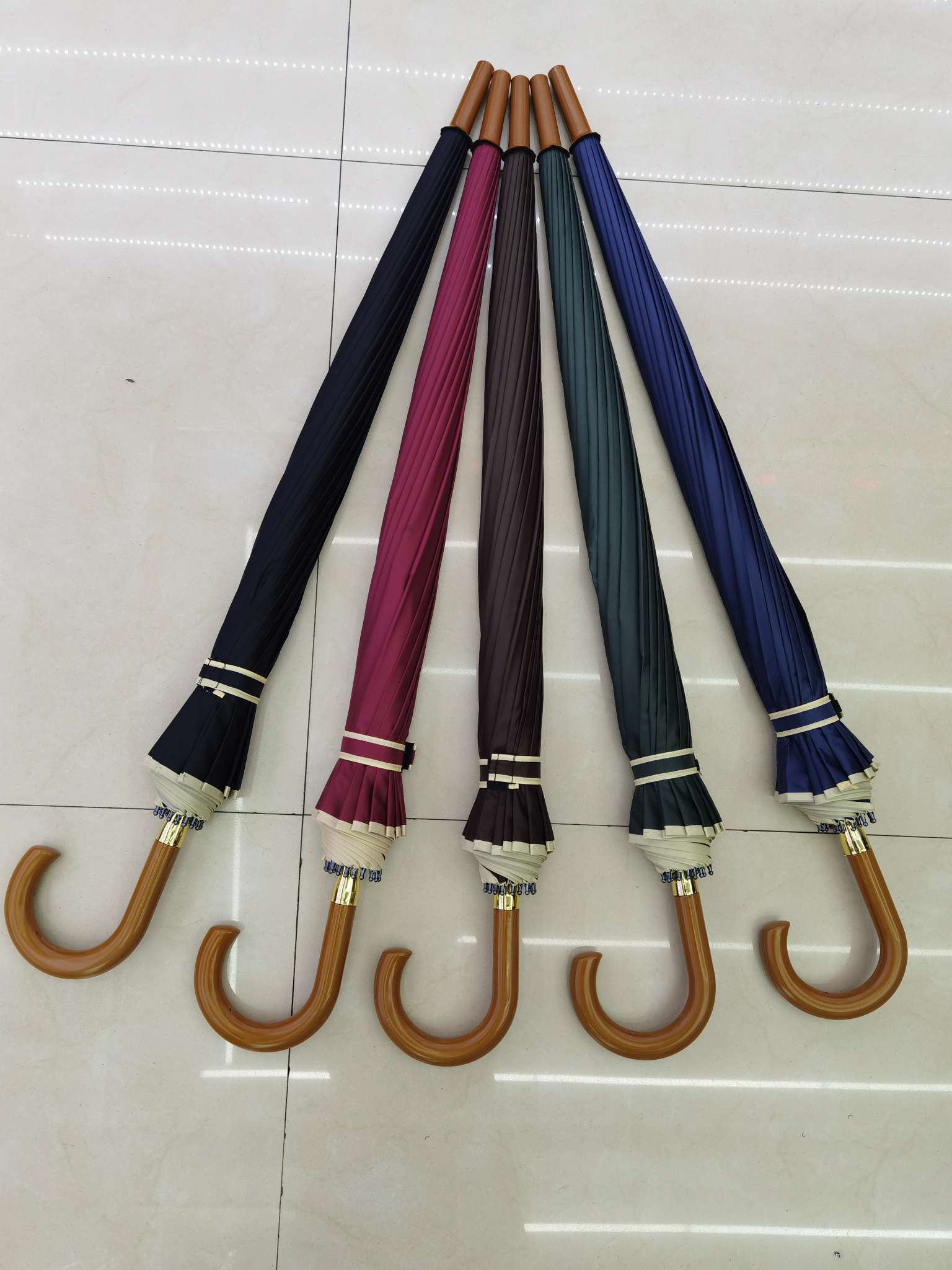 Factory direct sales of straight-stem umbrellas, edge-wrapped umbrellas, 16k automatic umbrellas, golf umbrellas, business umbrellas, and advertising umbrellas