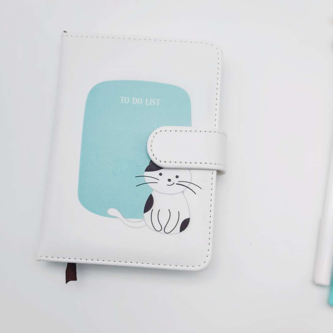 A student office bookend with a little cat's notebook Application Scenario