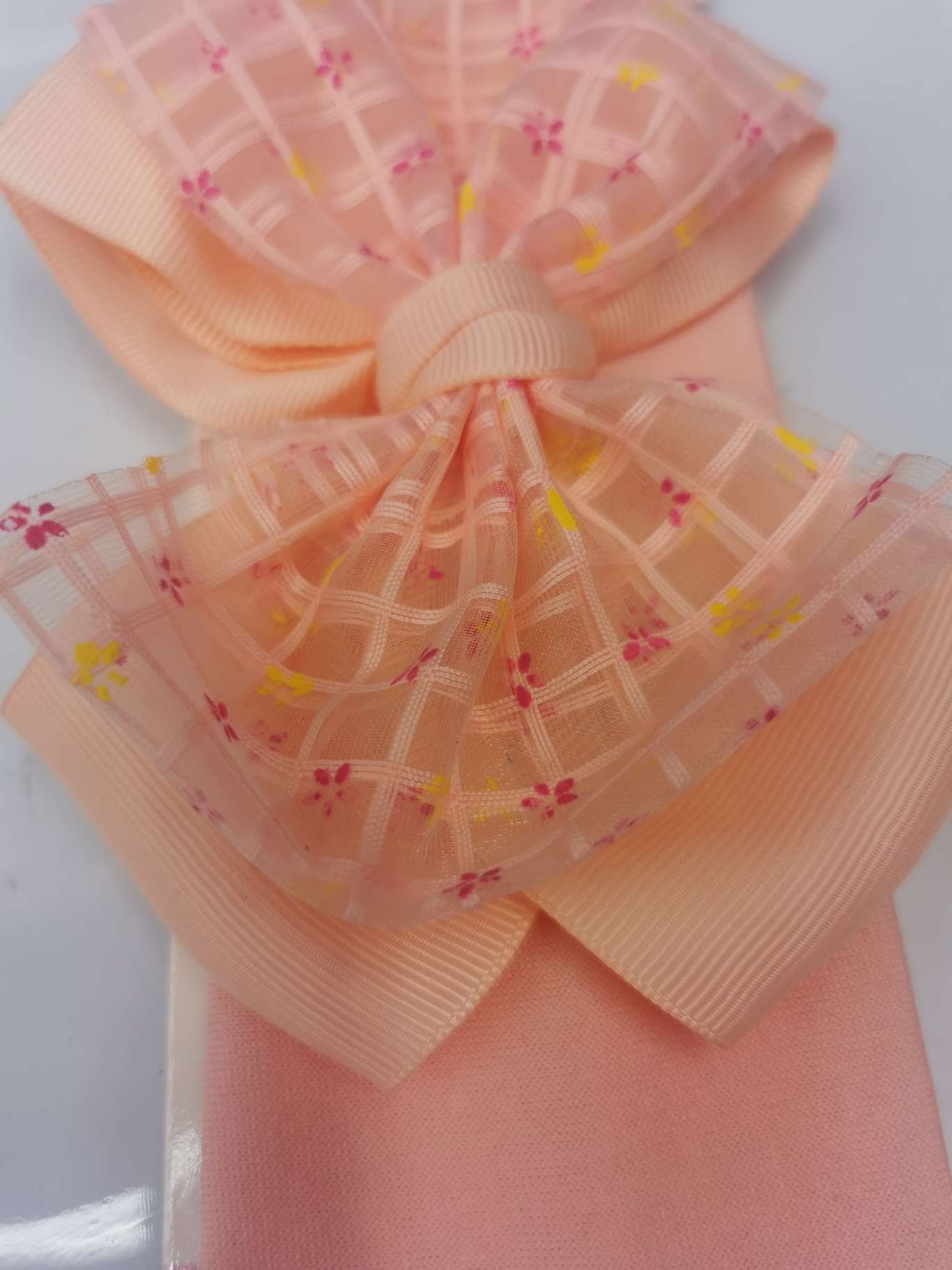 Checkered hair band details Picture