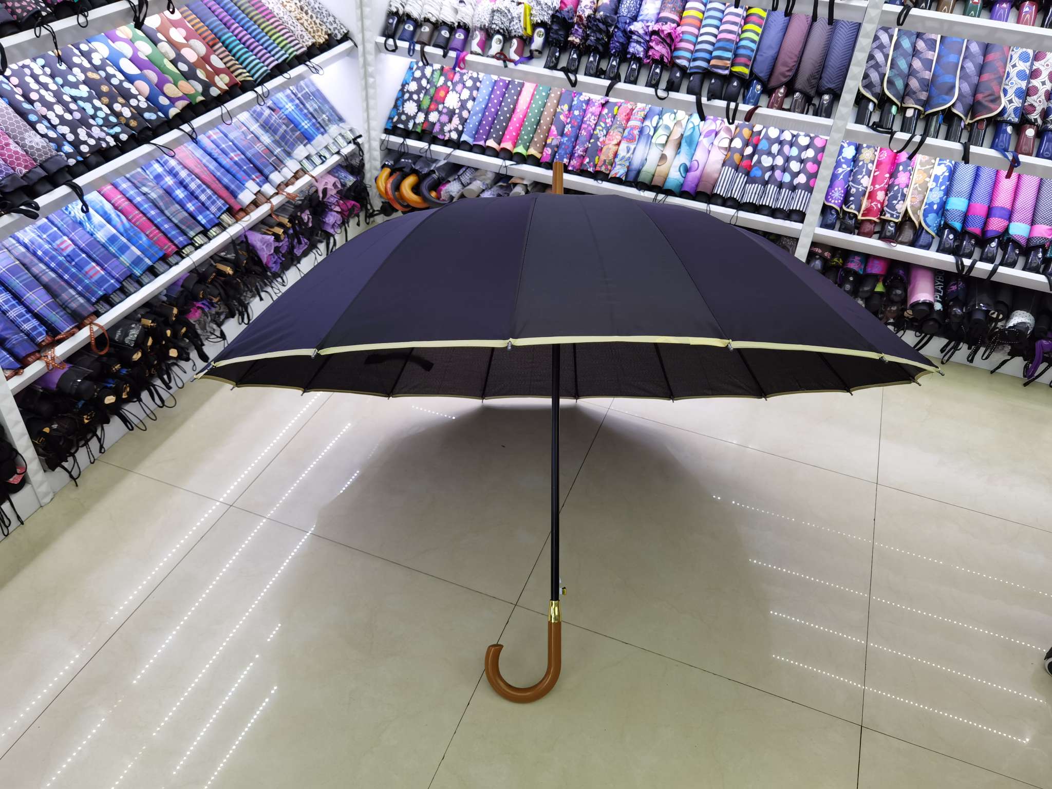 Factory direct sales of straight-stem umbrellas, edge-wrapped umbrellas, 16k automatic umbrellas, golf umbrellas, business umbrellas, and advertising umbrellas Item Picture
