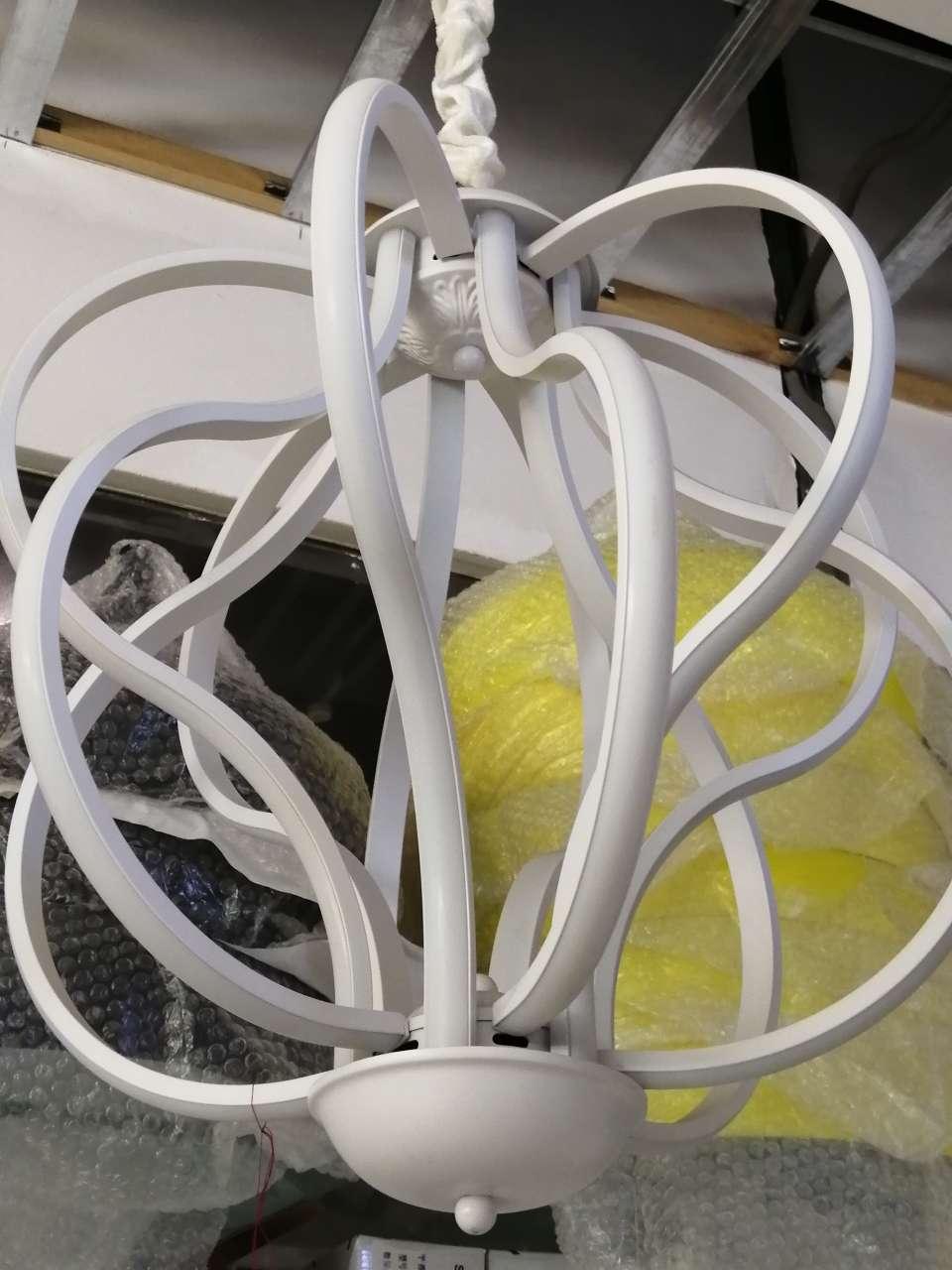A modern chandelier with a new line design