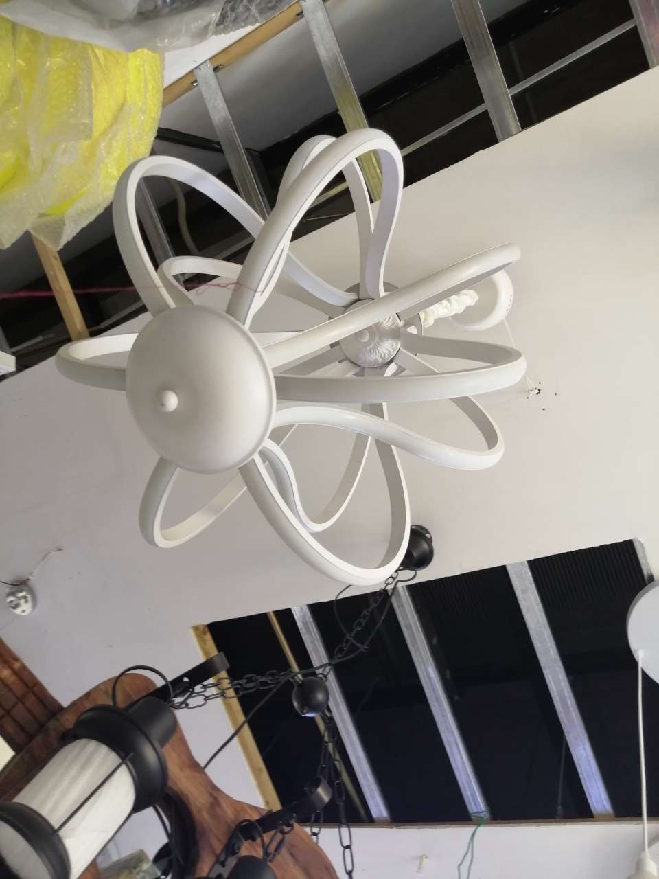 A modern chandelier with a new line design Specification image