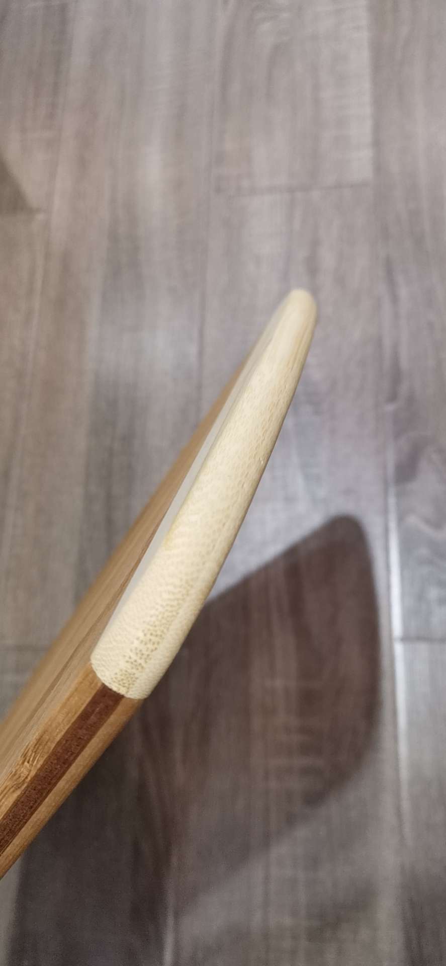 The dual-purpose bamboo cutting board can be used to cut fruits and is easy to clean Item Picture