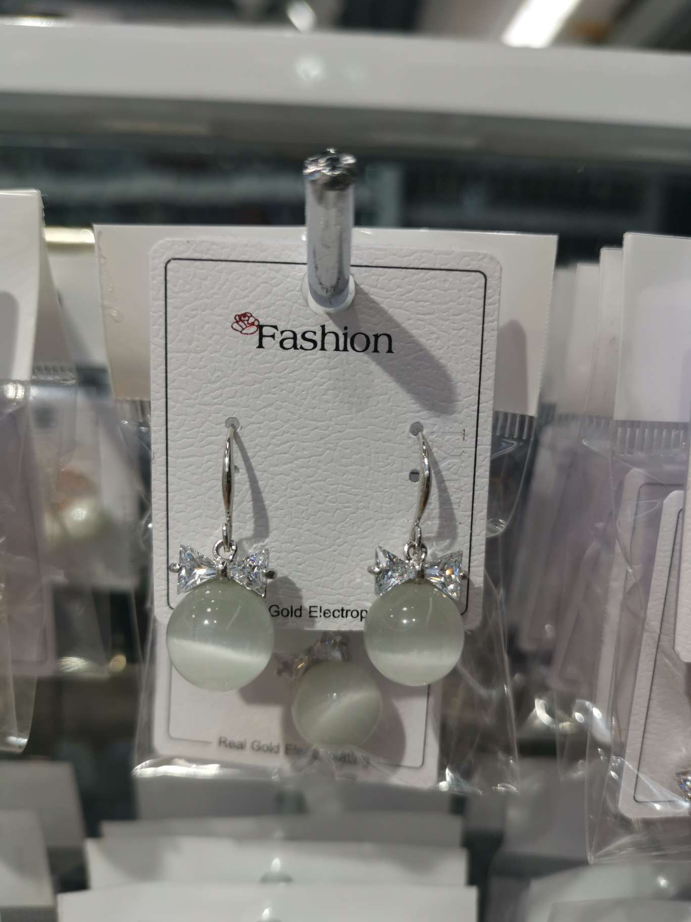 Bow cat's eye stone earrings