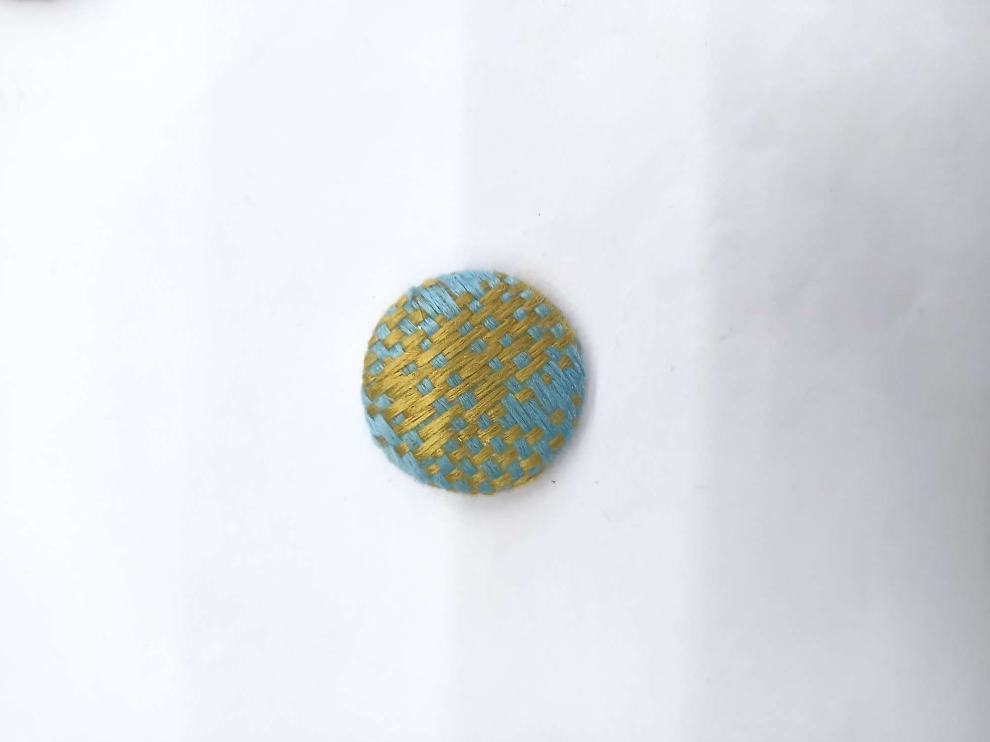 2.5高档布平扣产品图