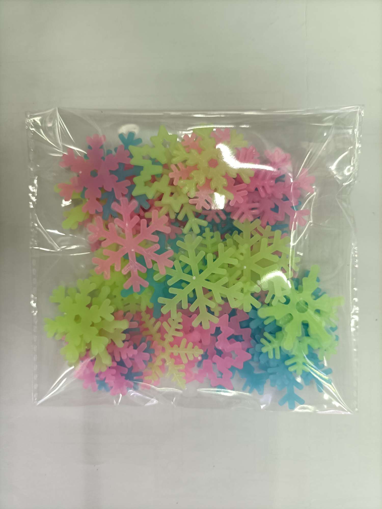 Noctilucent snowflakes come in packs of 50