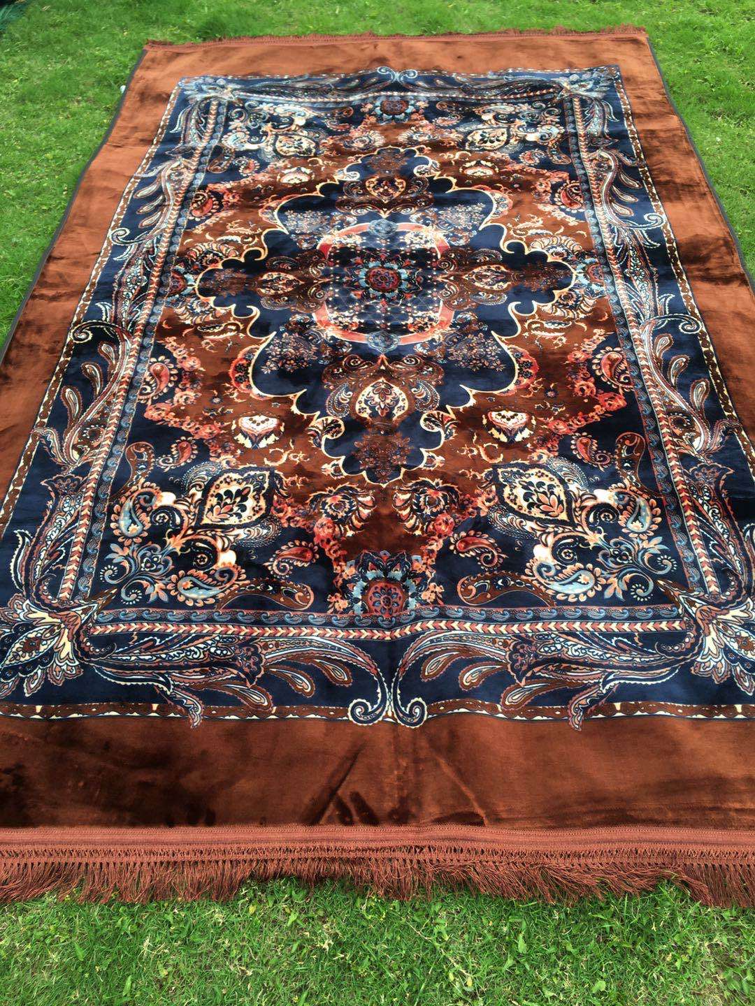 The bedding is a Muslim-printed carpet and a prayer carpet