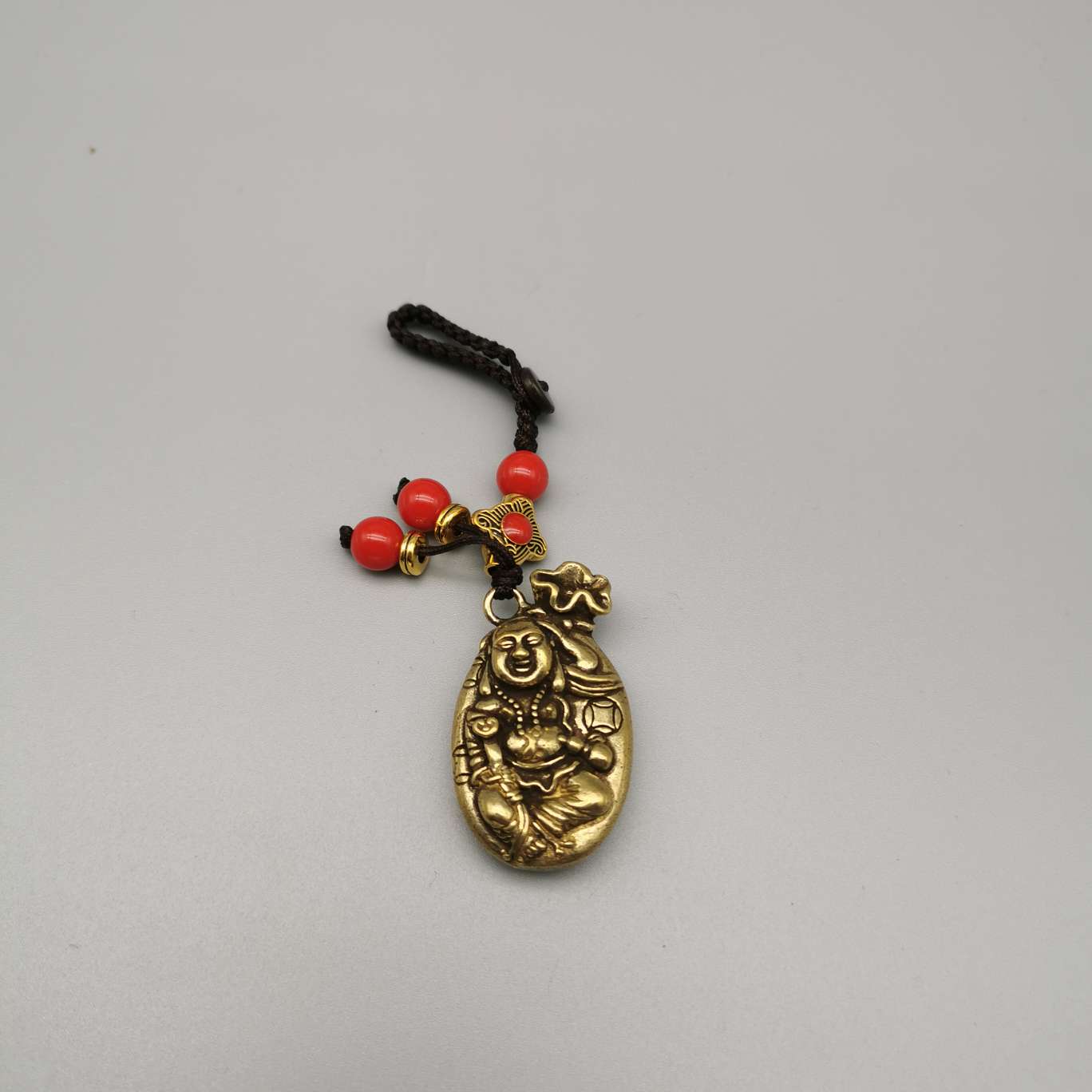 Wholesale of copper keychains, copper lion heads, bell fish, God of Wealth heart Sutra, bell carts, Anfo copper gourds and pendants undefined