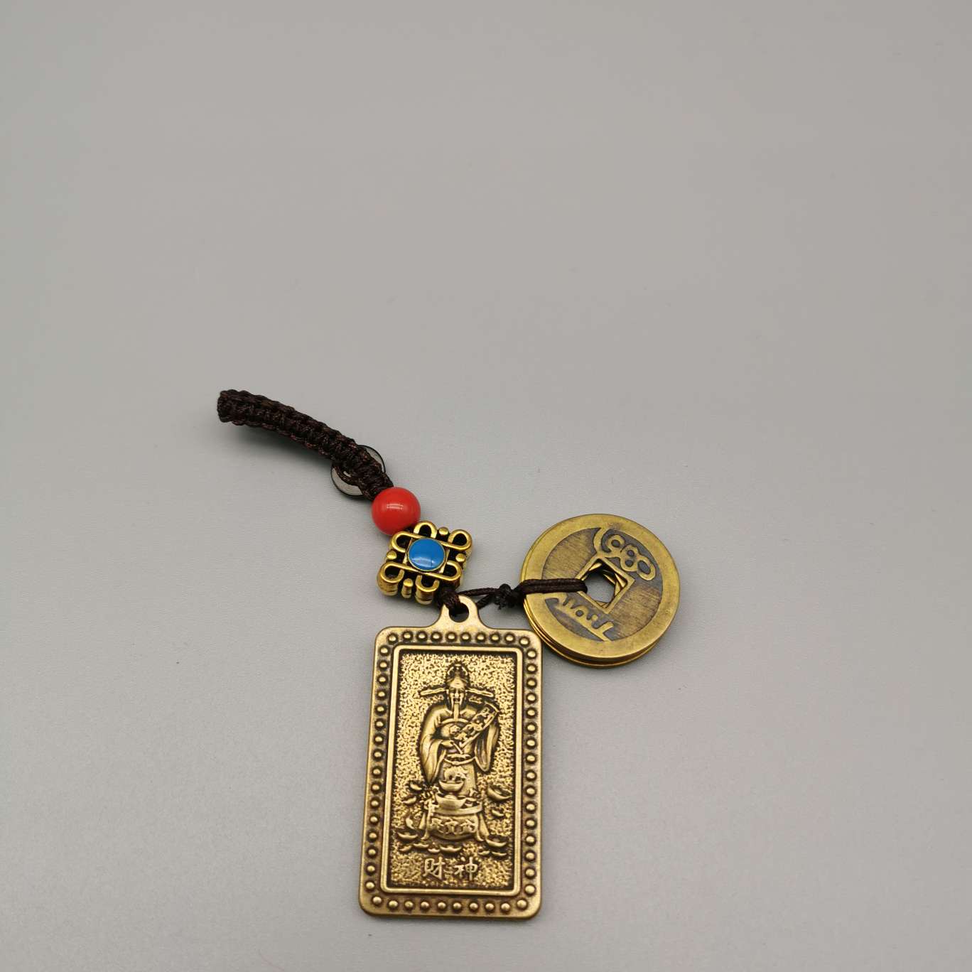 Wholesale of copper keychains, copper lion heads, bell fish, God of Wealth heart Sutra, bell carts, Anfo copper gourds and pendants undefined