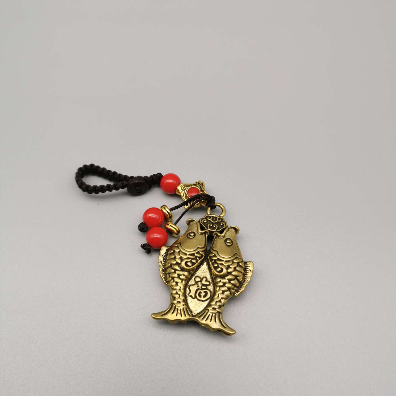Wholesale of copper keychains, copper lion heads, bell fish, God of Wealth heart Sutra, bell carts, Anfo copper gourds and pendants Application Scenario