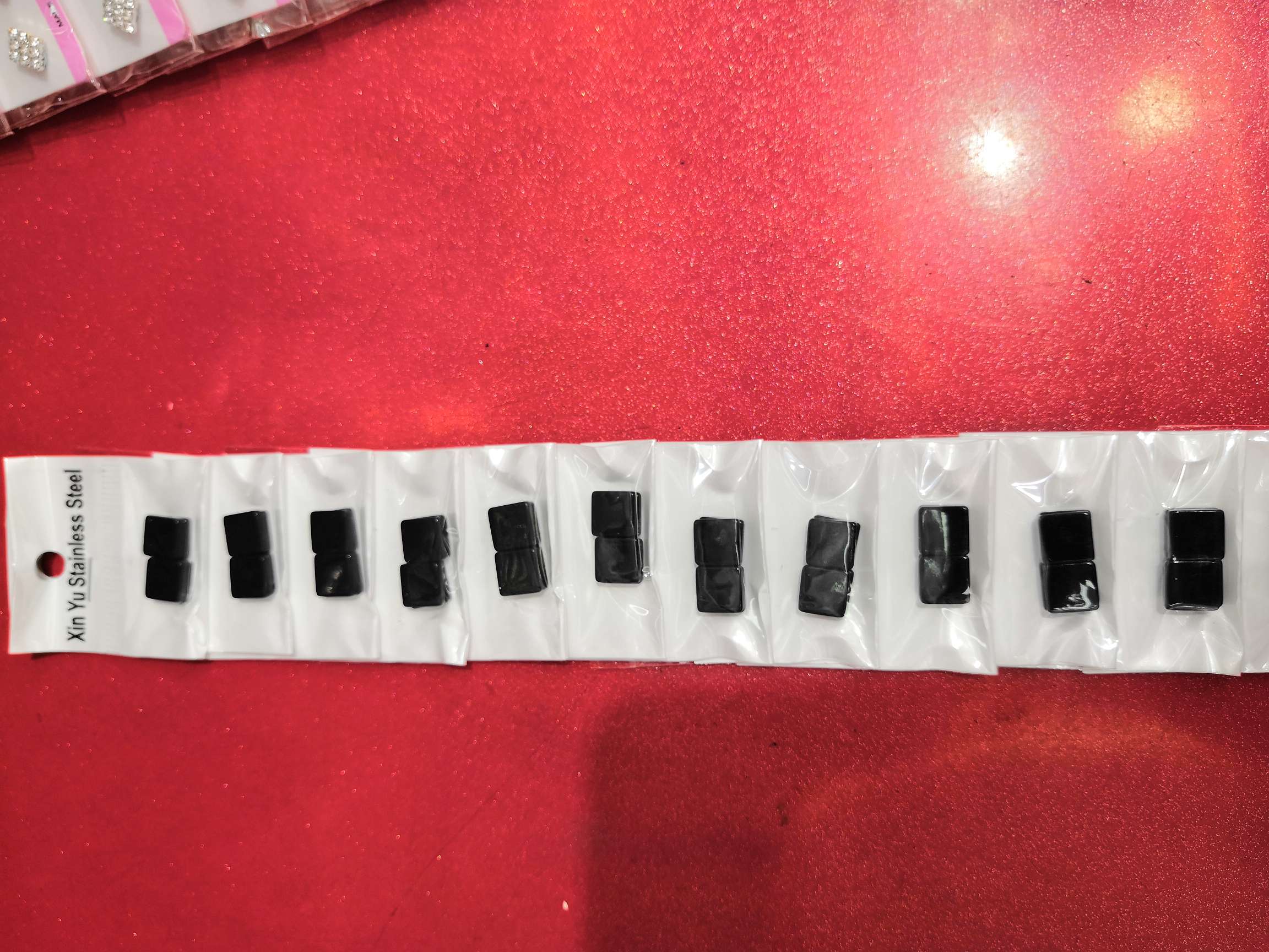 Double-sided square iron suction ear studs