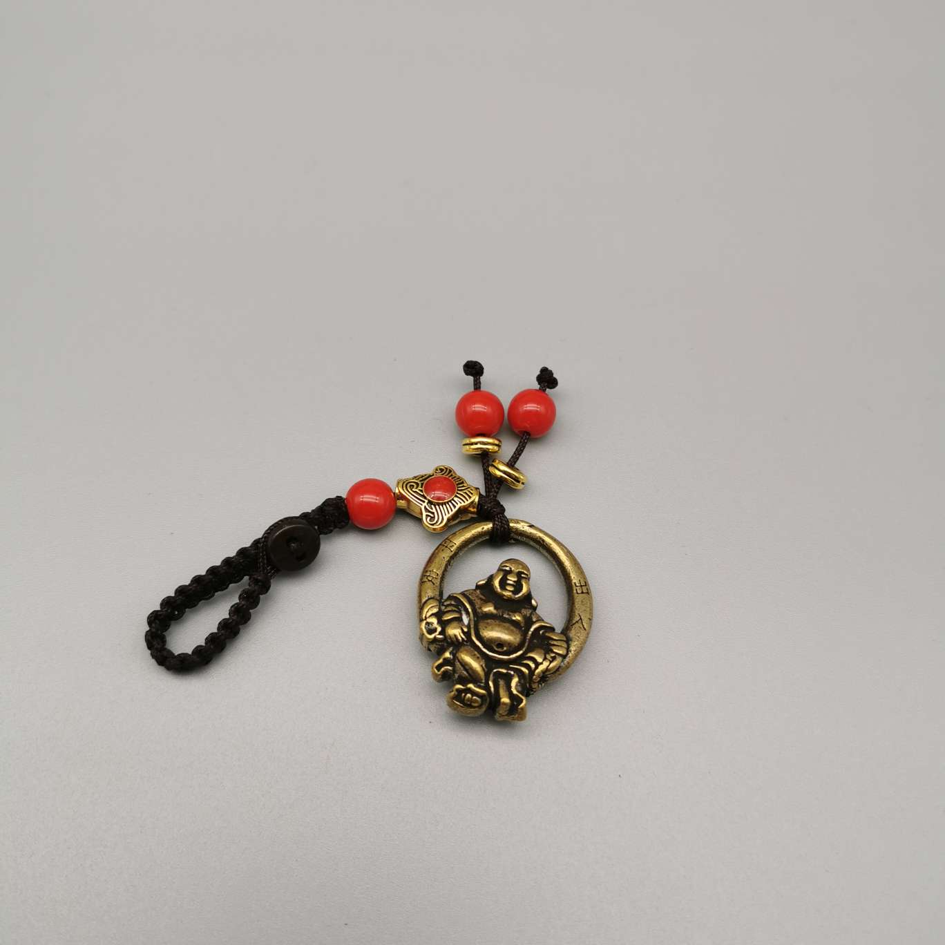 Wholesale of copper keychains, copper lion heads, bell fish, God of Wealth heart Sutra, bell carts, Anfo copper gourds and pendants Item Picture