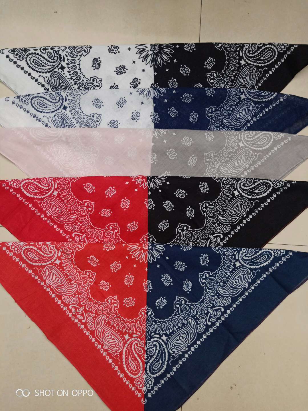 The cotton square towel is multi-colored