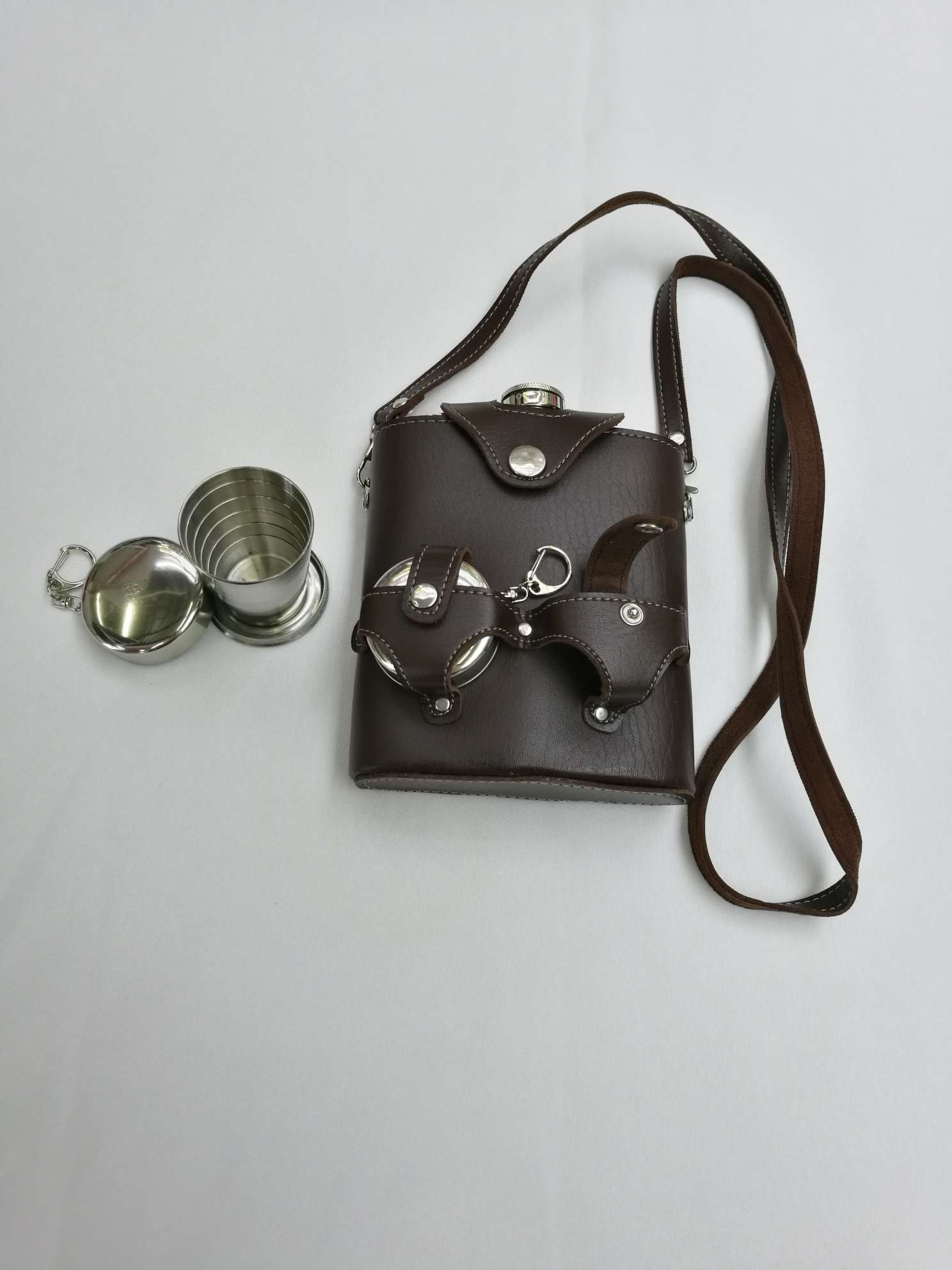 An 18 oz sante flask holster combination