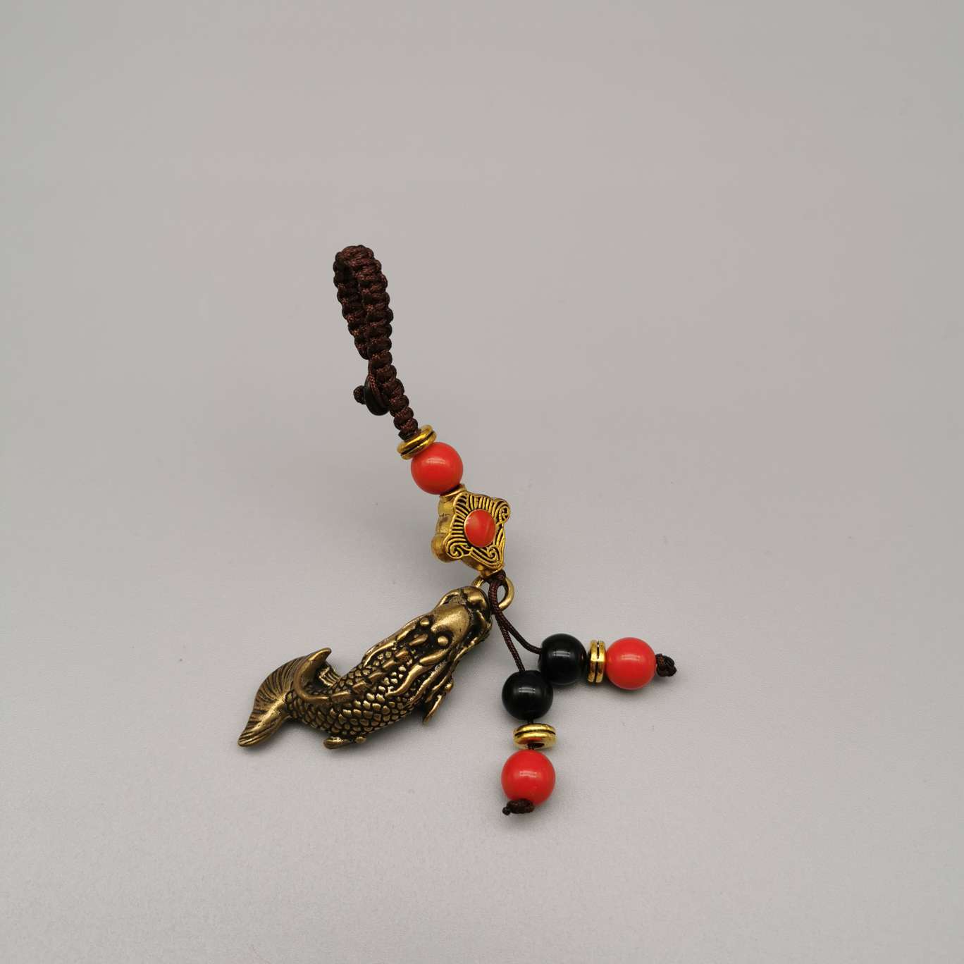 Wholesale of copper keychains, copper lion heads, bell fish, God of Wealth heart Sutra, bell carts, Anfo copper gourds and pendants undefined