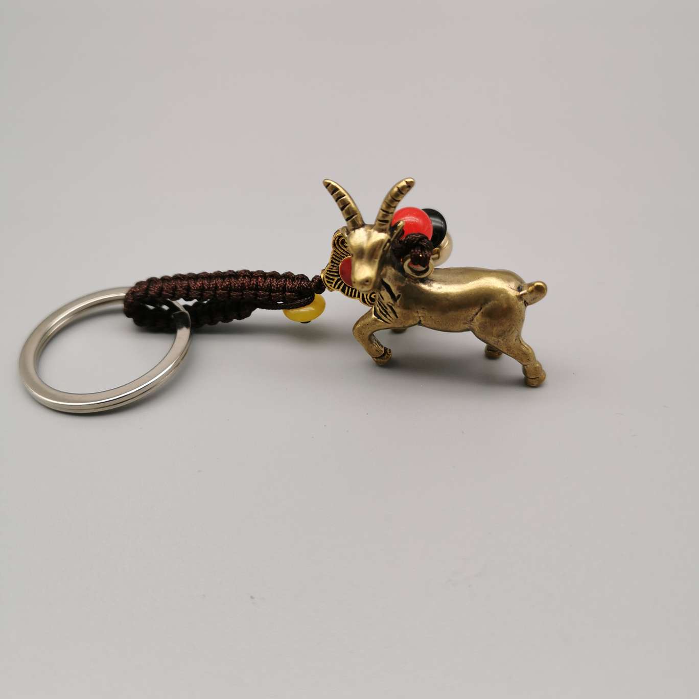 Copper keychain, copper monkey axe, God of Wealth, antelope, elephant, qilin, sika deer, coiled dragon God, Buddha's hand undefined