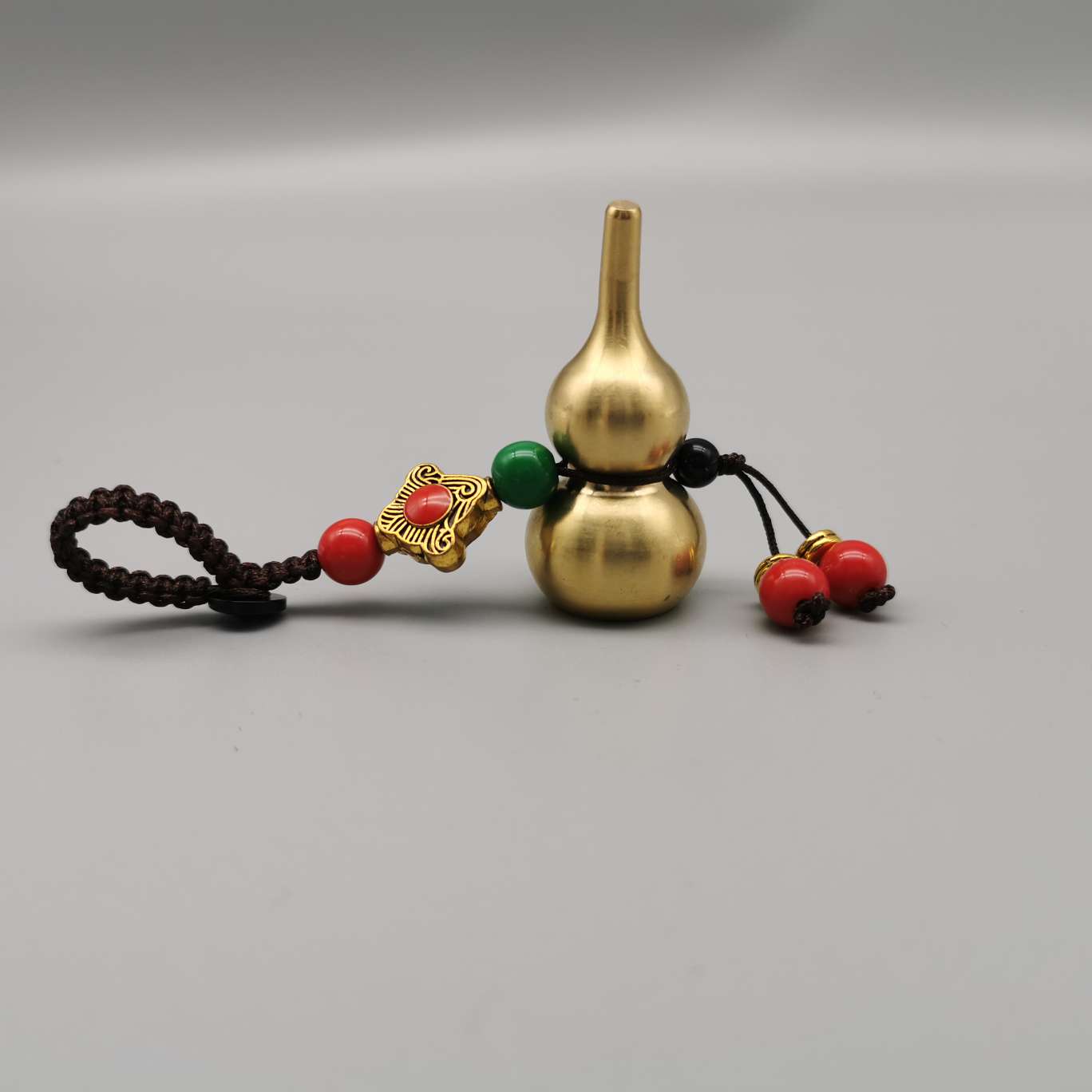Wholesale of copper keychains, copper lion heads, bell fish, God of Wealth heart Sutra, bell carts, Anfo copper gourds and pendants undefined