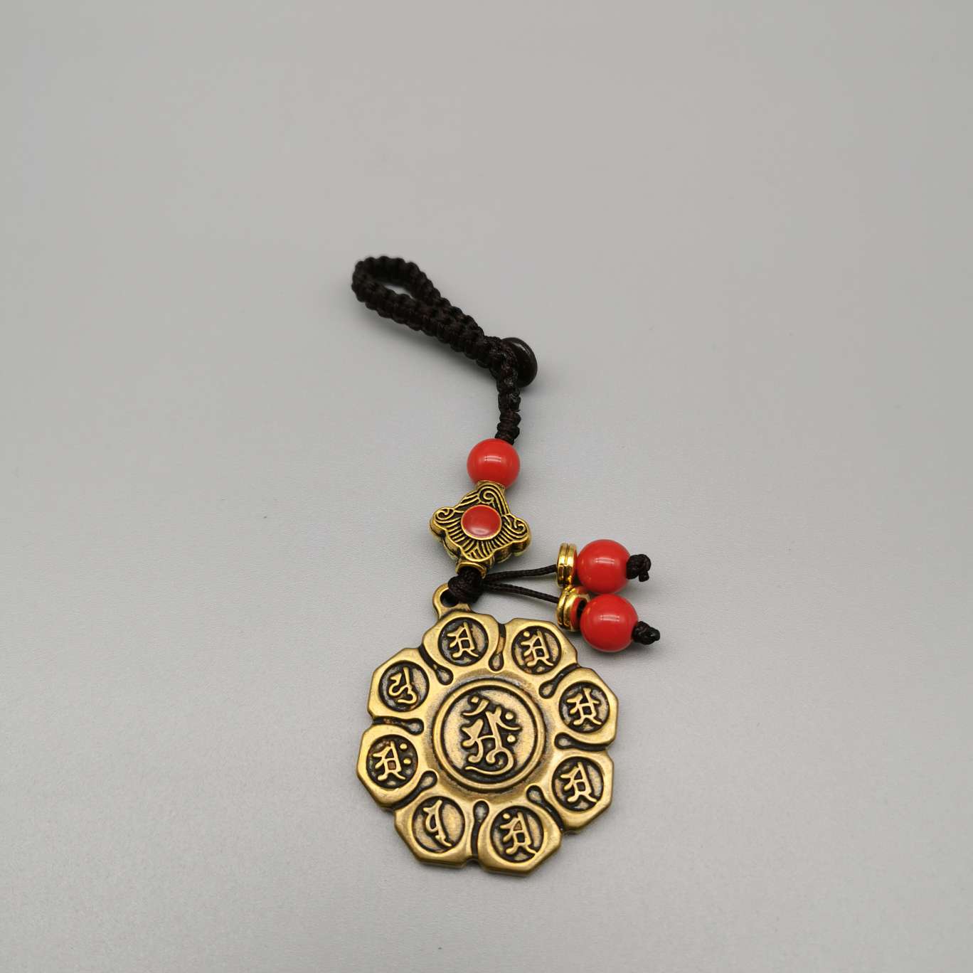 Wholesale of copper keychains, copper lion heads, bell fish, God of Wealth heart Sutra, bell carts, Anfo copper gourds and pendants Specification image