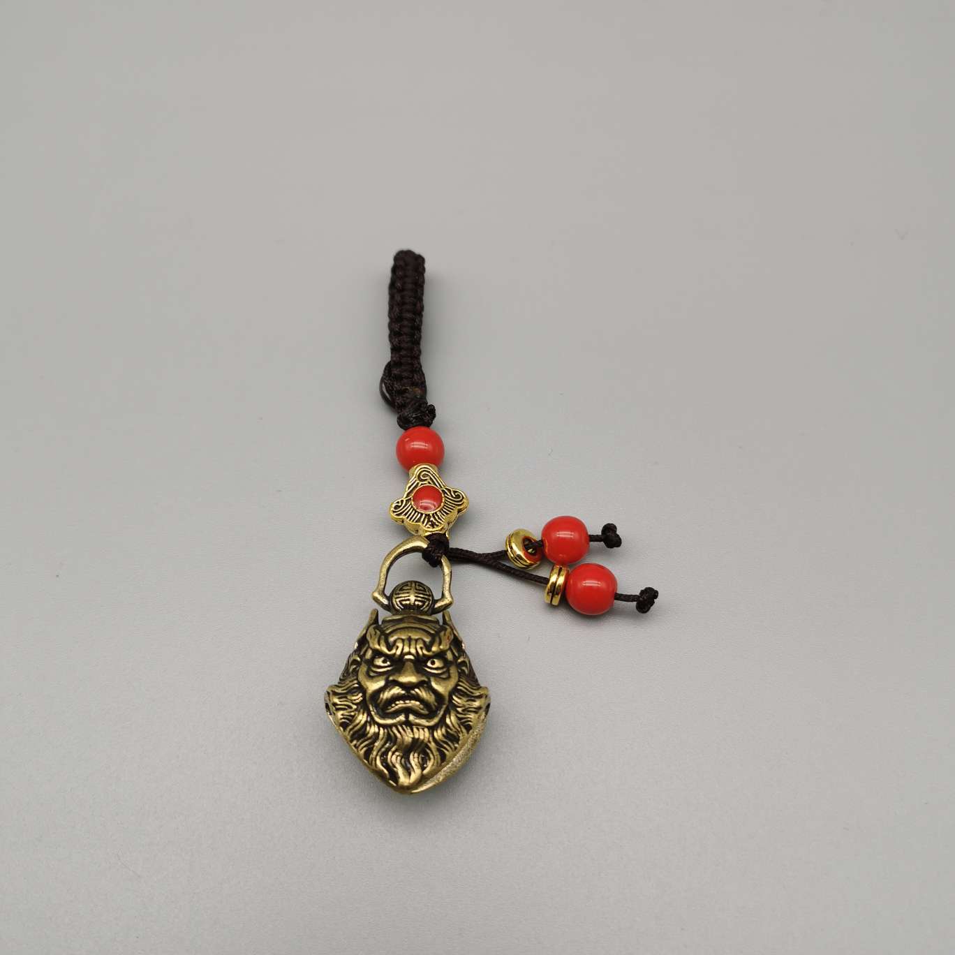 Wholesale of copper keychains, copper lion heads, bell fish, God of Wealth heart Sutra, bell carts, Anfo copper gourds and pendants details Picture