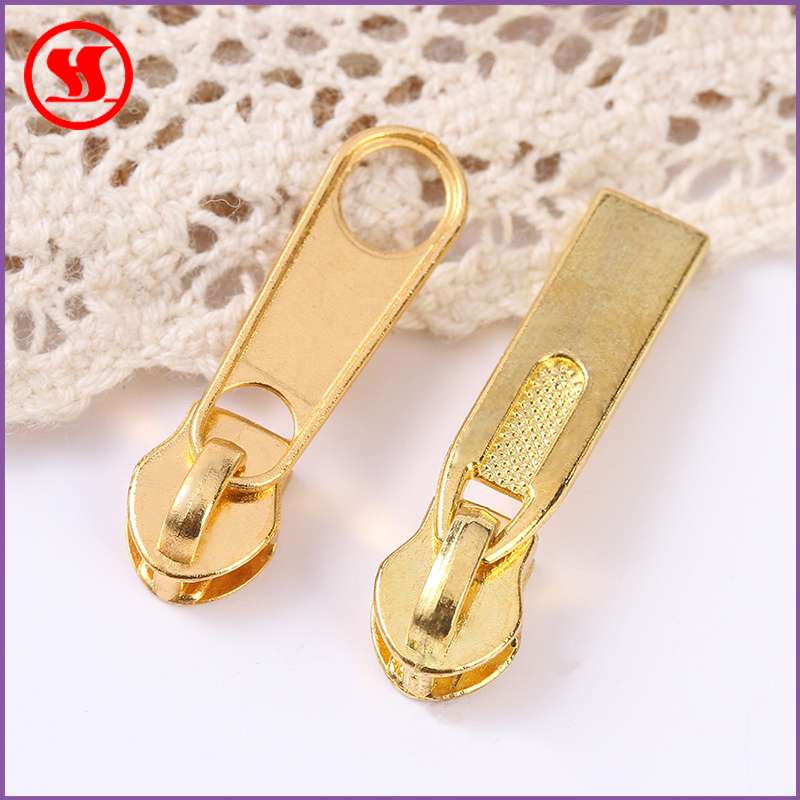 No. 5 gold plated puller is optional