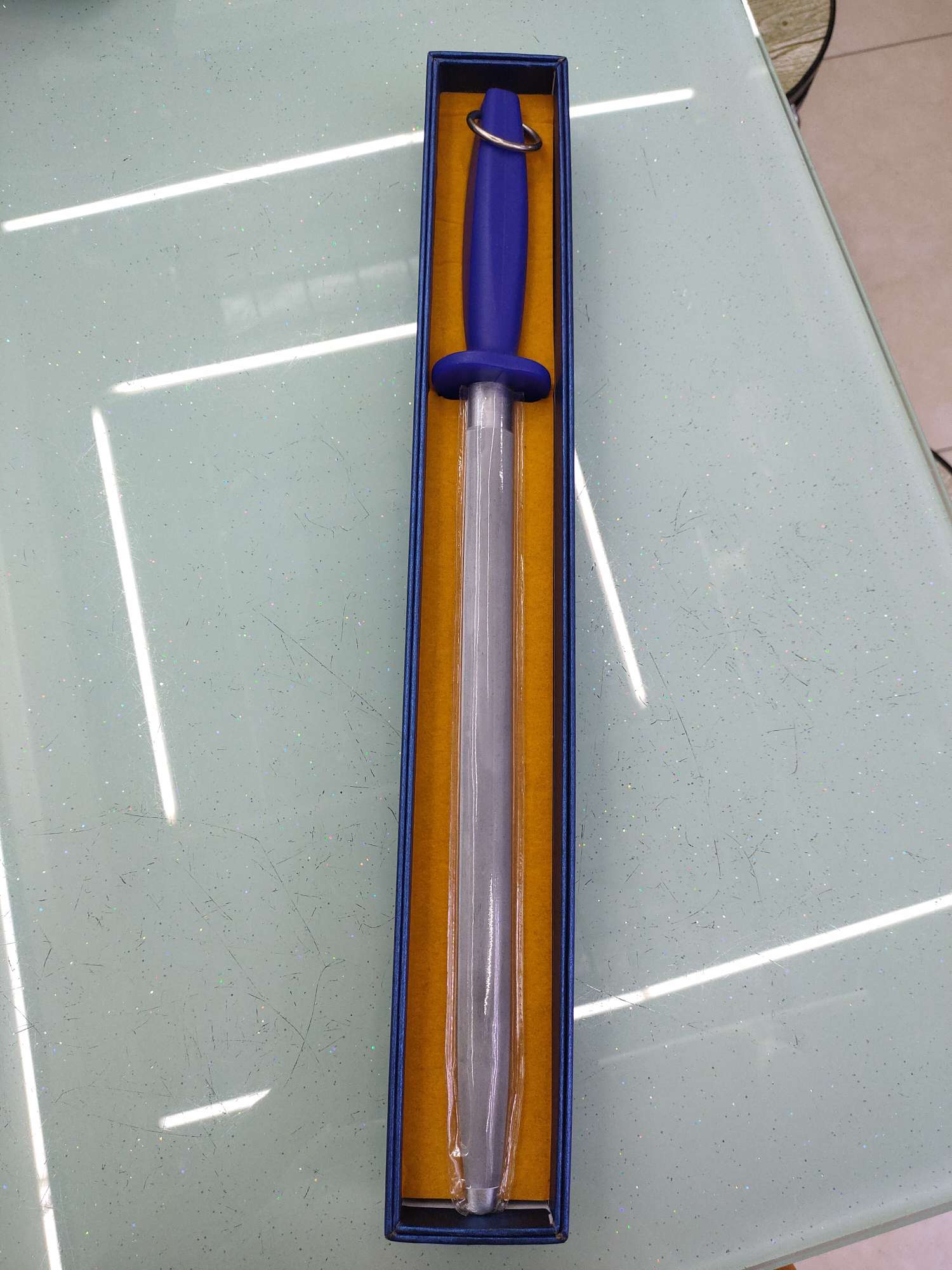 Carborundum knife sharpening rod