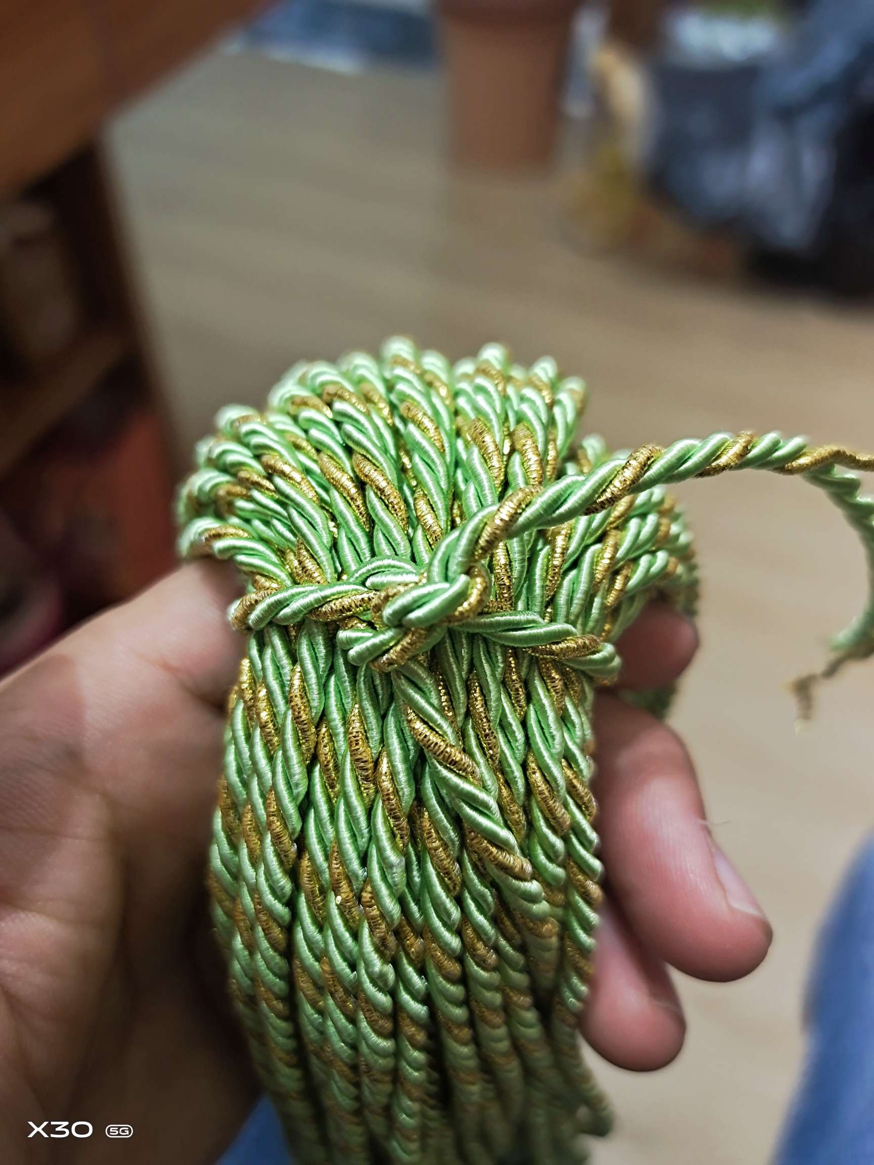 3mm single color (light yellow)+ gold polyester three-strand rope for clothing accessories, hats, bags and other accessories Specification image