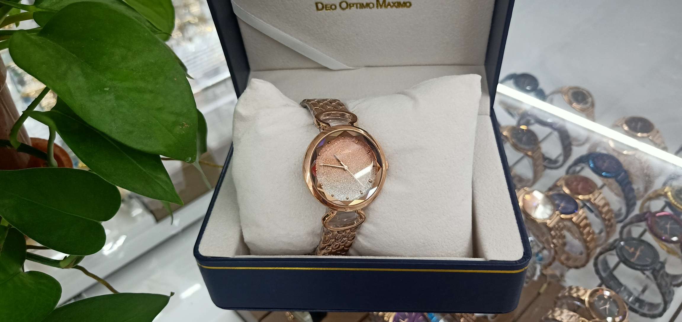A beautiful ladies' watch with blurred yellow sand patterns and dazzling colors details Picture
