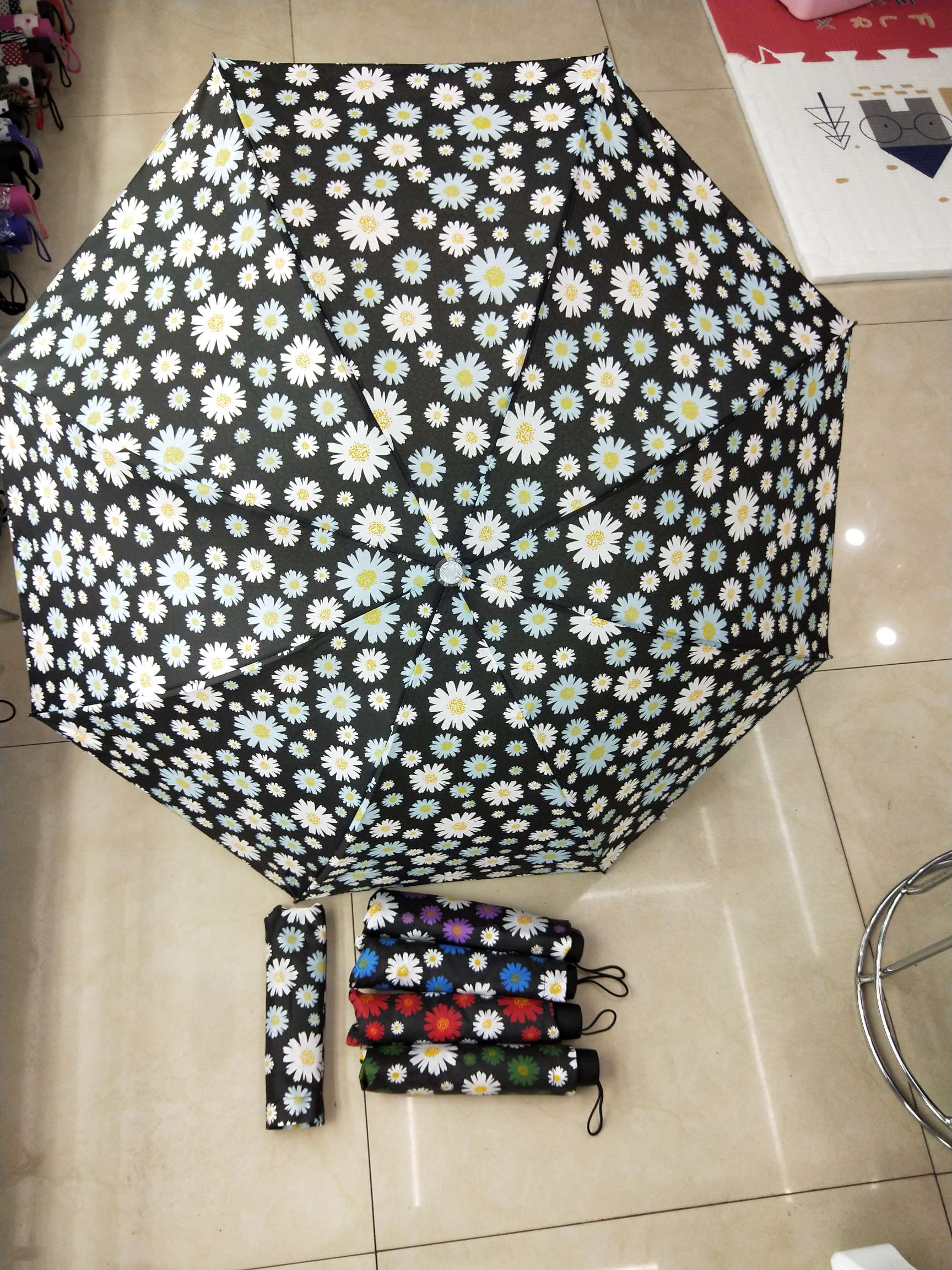 Three-fold umbrella