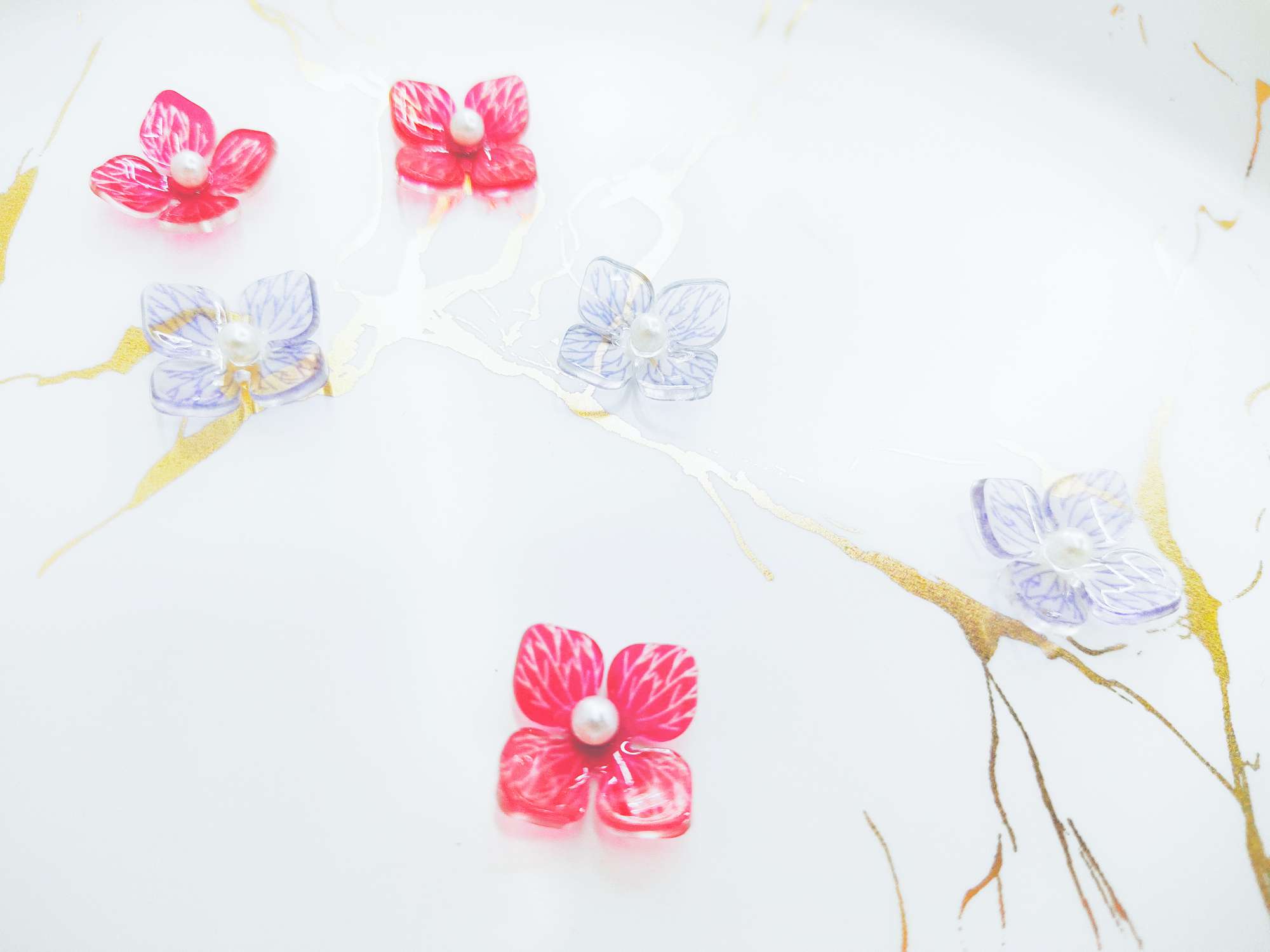 Epoxy resin heat shrink sheet printed four-leaf flower jewelry accessories Specification image