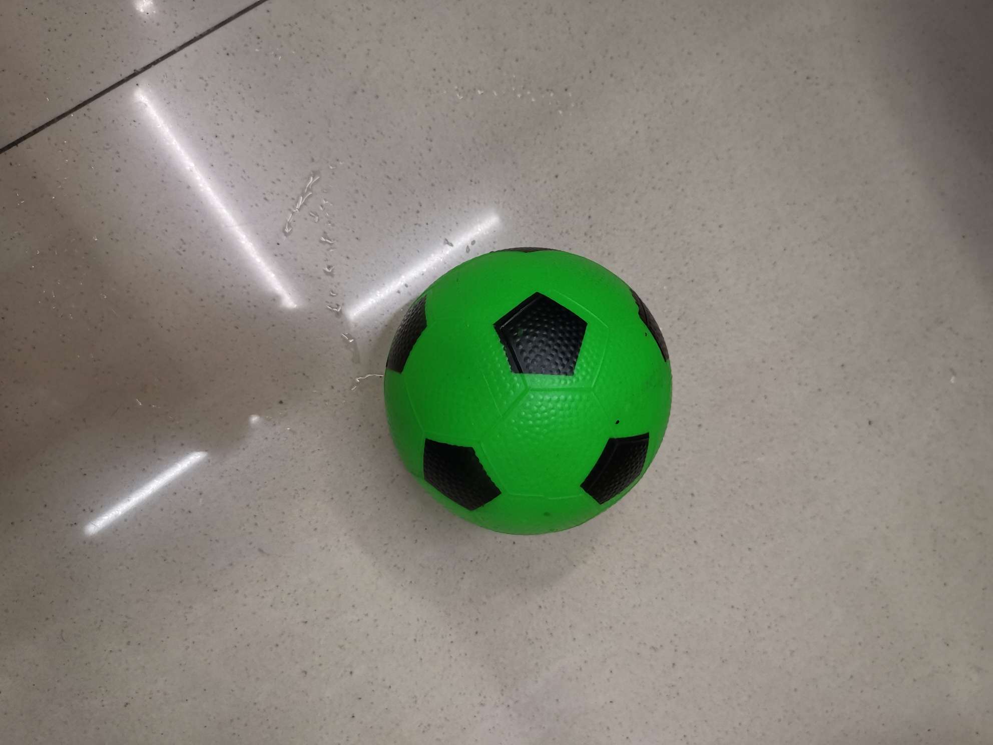 Number 10 sprays a football