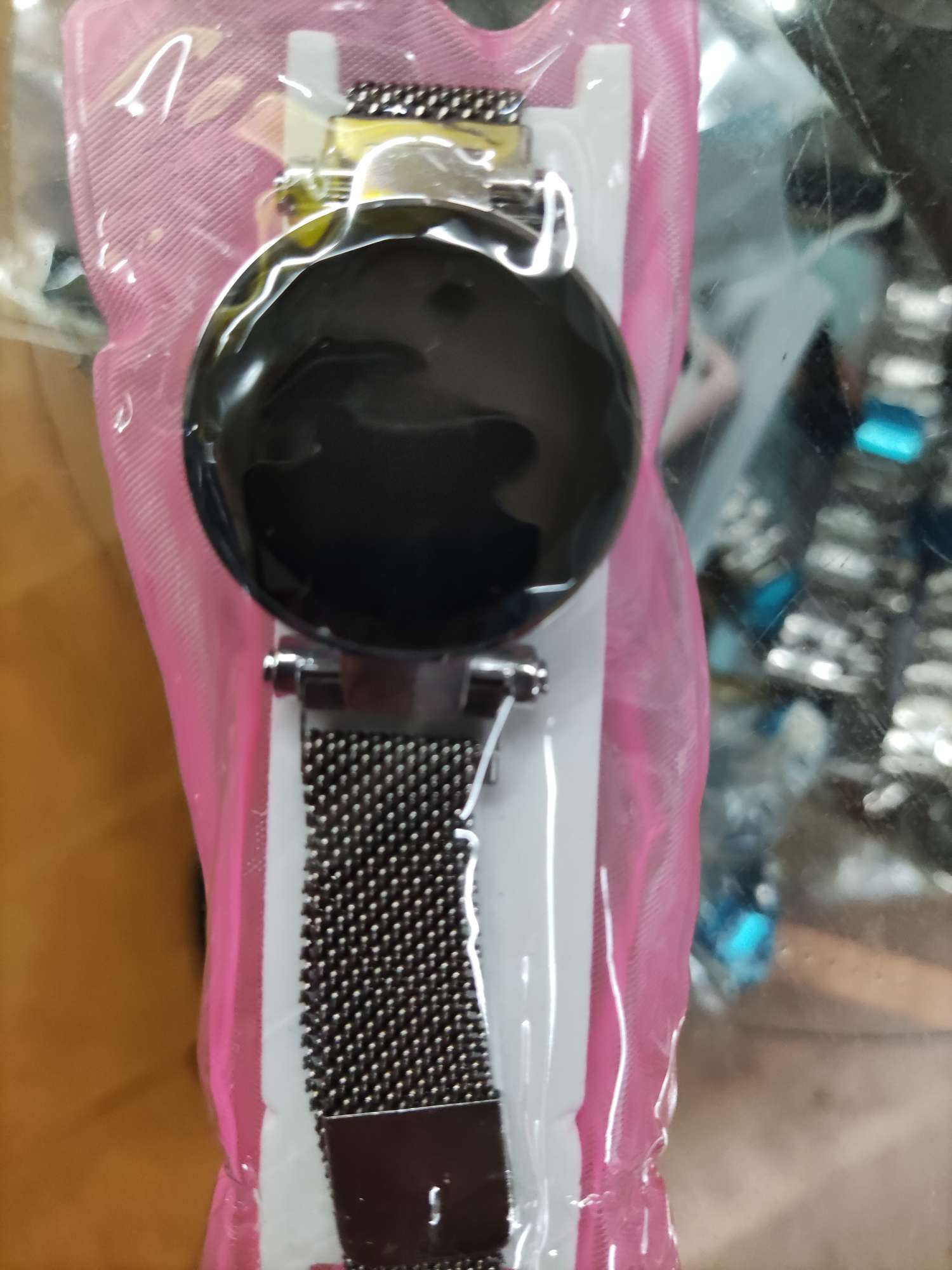 Silver bracelet and black dial electronic watch