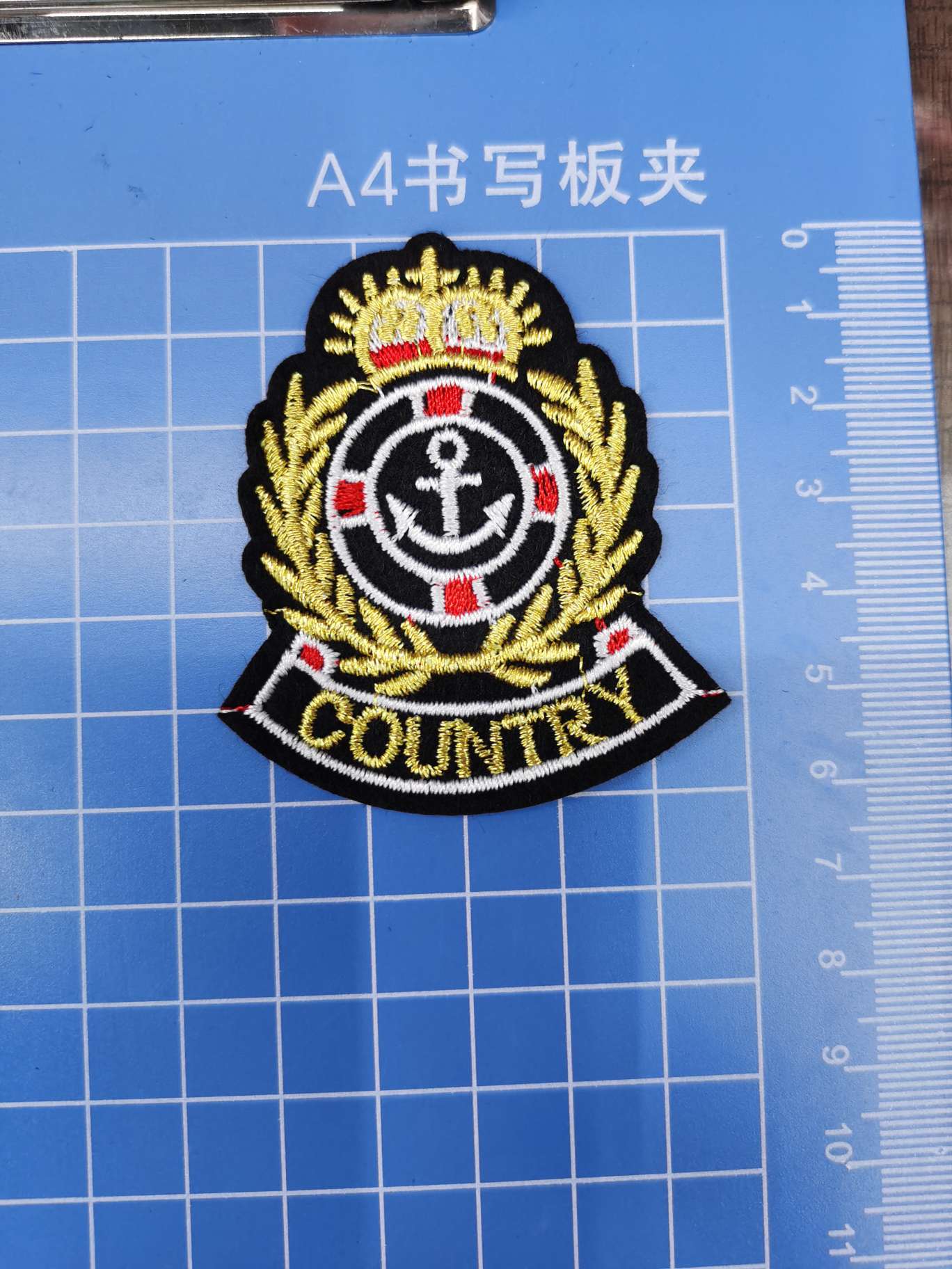Gold thread badge