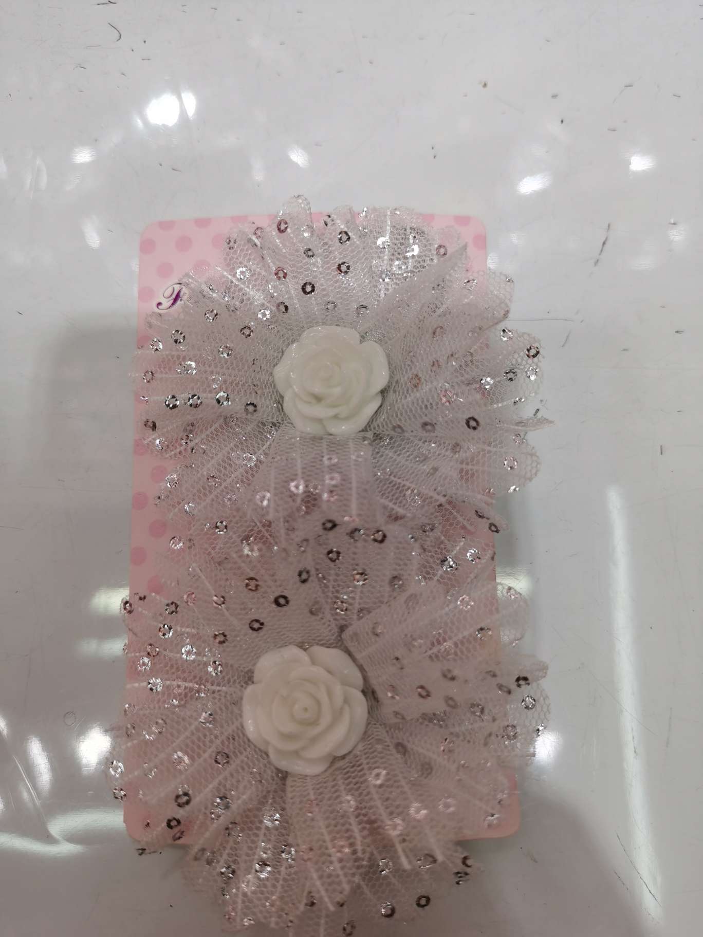 Round the flower on the clip