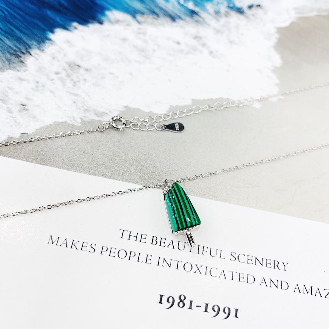 The s925 silver ice cream pendant necklace is made of white mother-of-pearl and malachite, which does not fade or cause allergies undefined