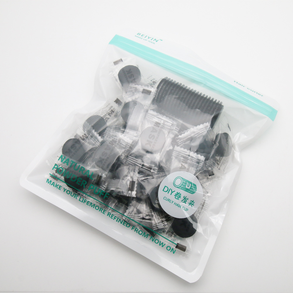 Black bamboo charcoal compression mask 50 disposable non-woven mask paper travel compression mask paper wholesale