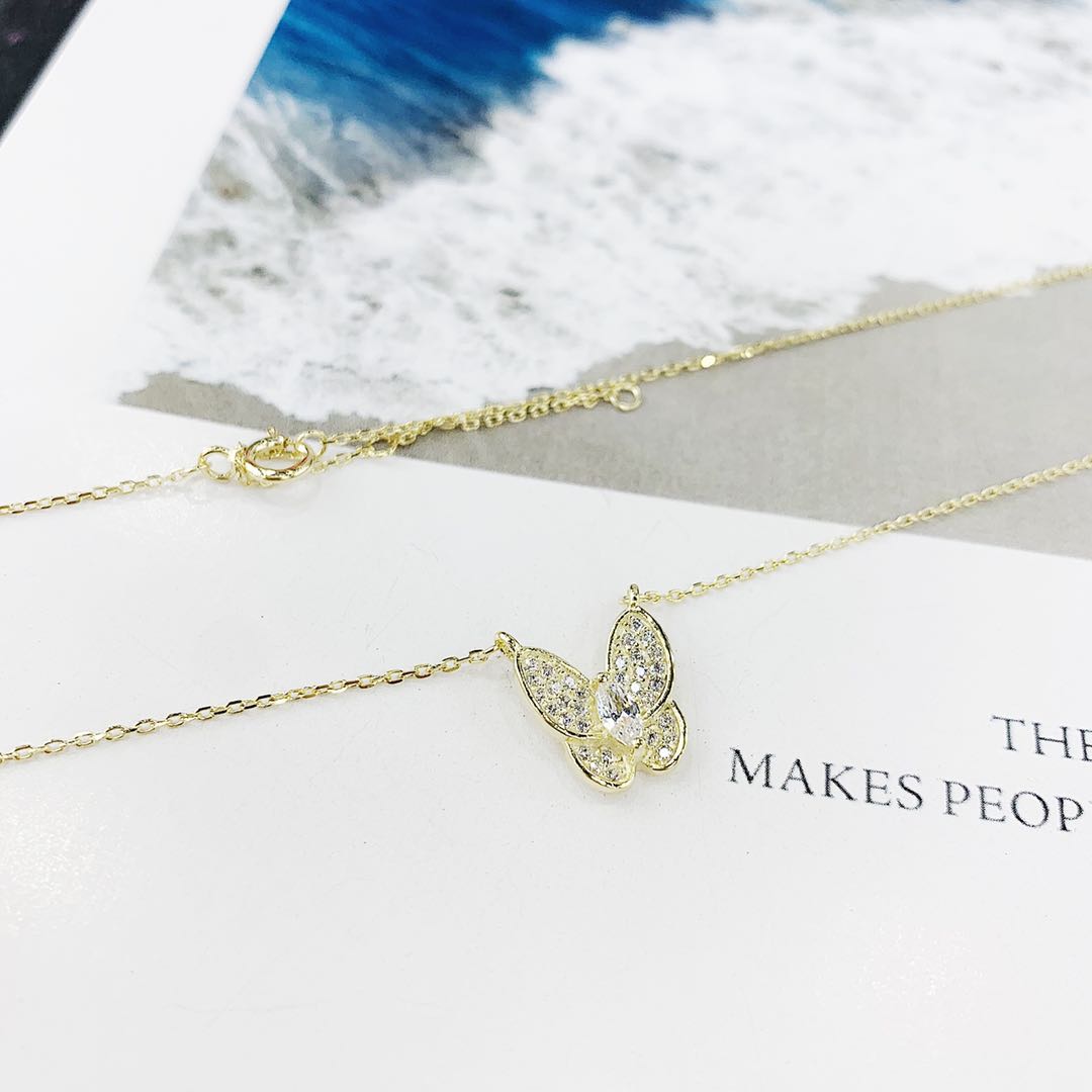 The s925 silver micro-studded butterfly necklace is non-allergenic in white and rose gold undefined