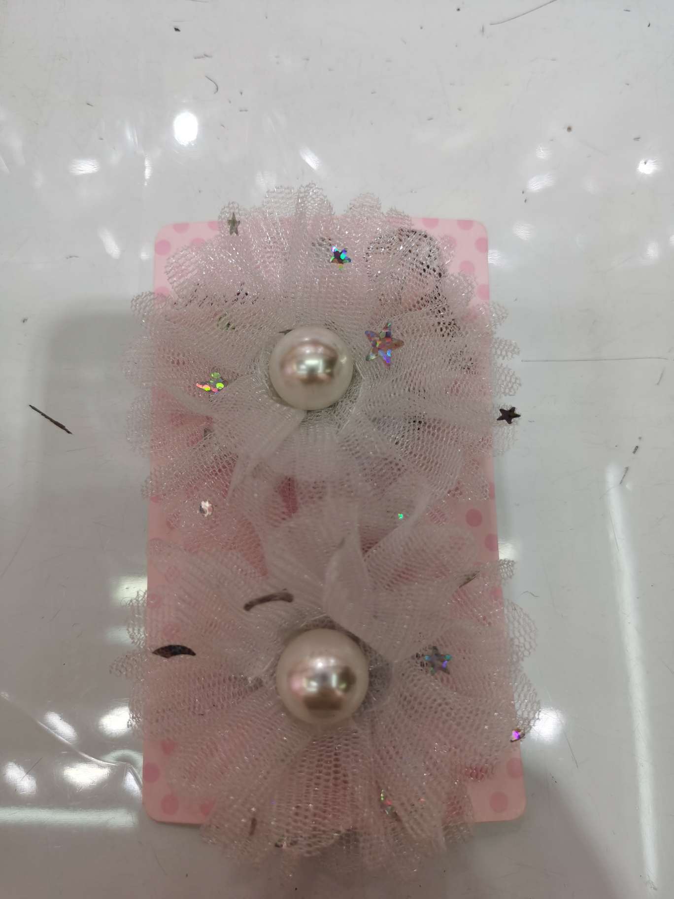 Clamped pearl flower