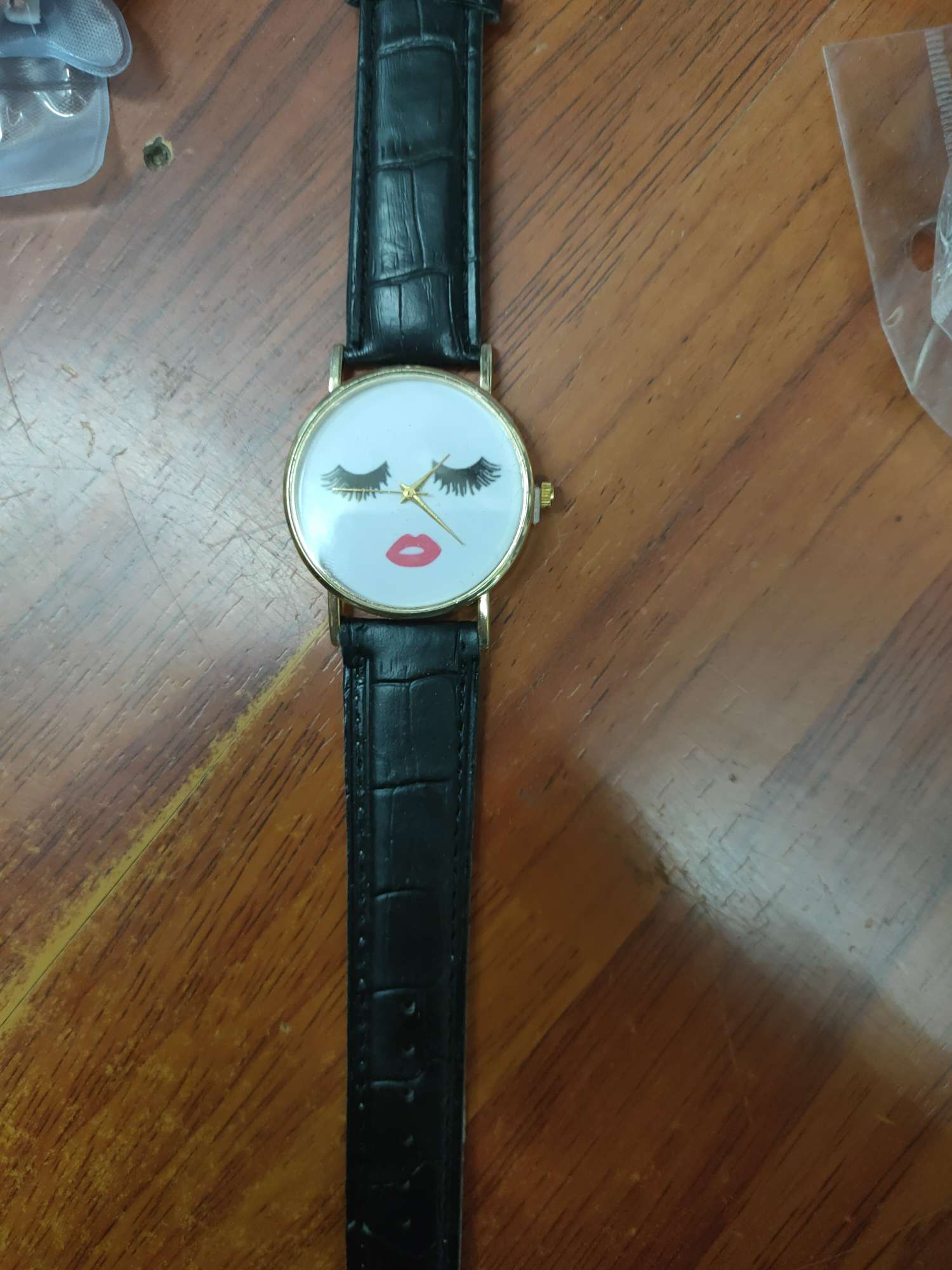 Black patterned leather strap watch